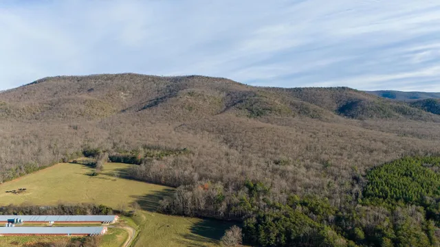 an aerial view of residential house and outdoor space