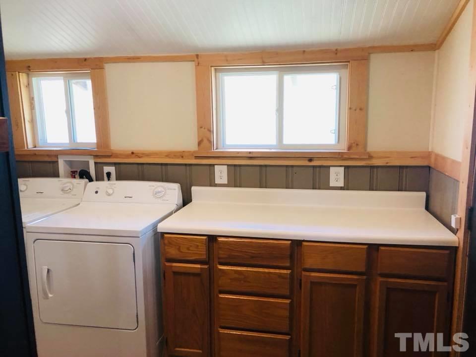 440 Ole Cabin Road Roxboro, NC 27574 - Photo 20 of 23 a utility room with dryer and washer