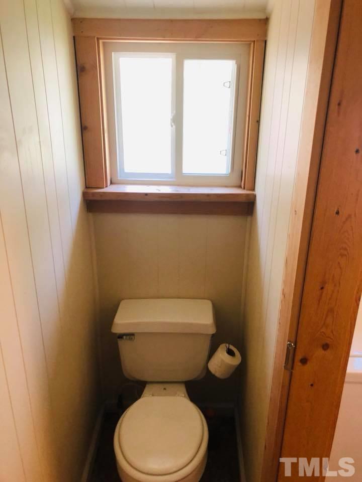 440 Ole Cabin Road Roxboro, NC 27574 - Photo 22 of 23 a bathroom with a toilet and a sink