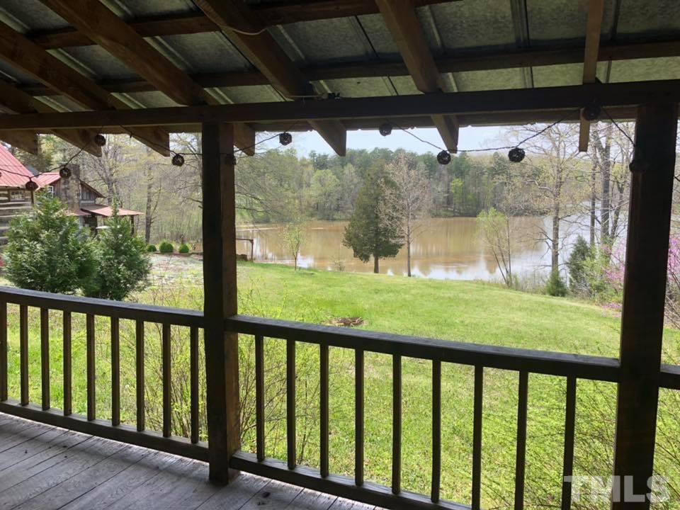 440 Ole Cabin Road Roxboro, NC 27574 - Photo 23 of 23 a view of a porch with a yard