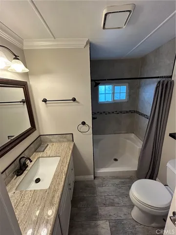 a view of empty room with windows