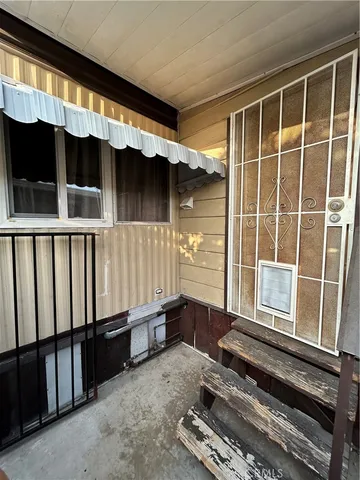 a close view of a utility room with washer and dryer