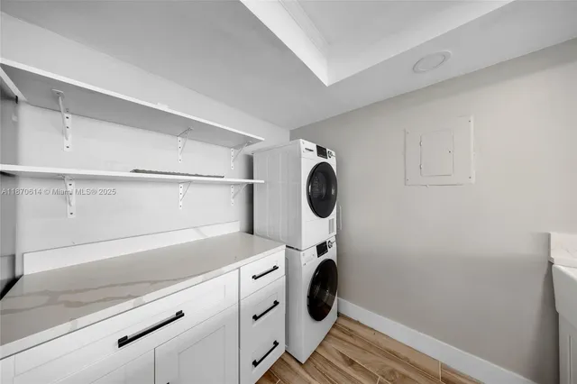 a living room with furniture a rug and a flat screen tv