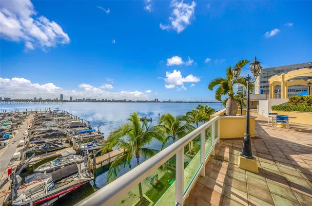 a view of a balcony with an ocean view
