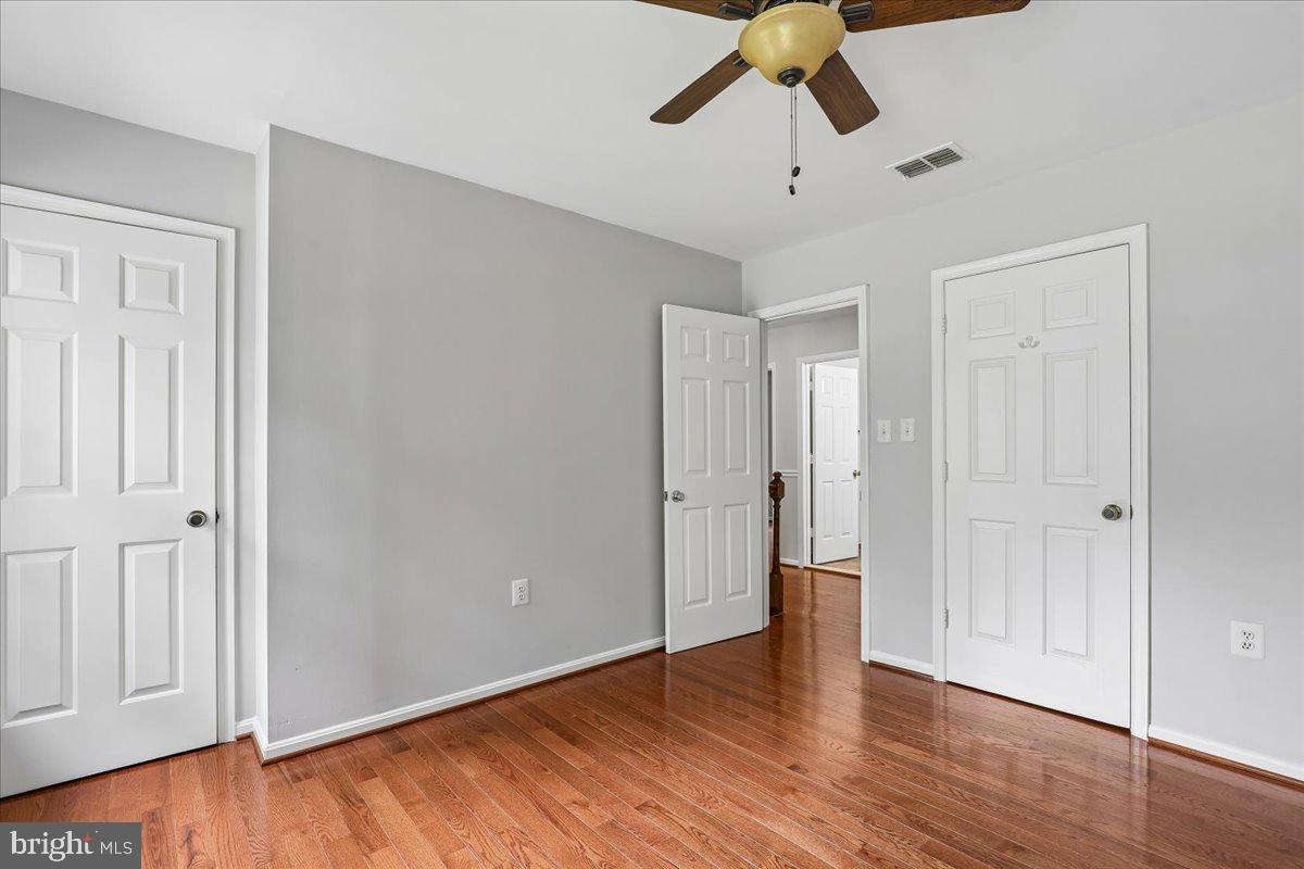 8253 Honeysuckle Road Manassas, VA 20112 - Photo 55 of 112 Bright 2nd Bedroom with lovely hardwood floors.