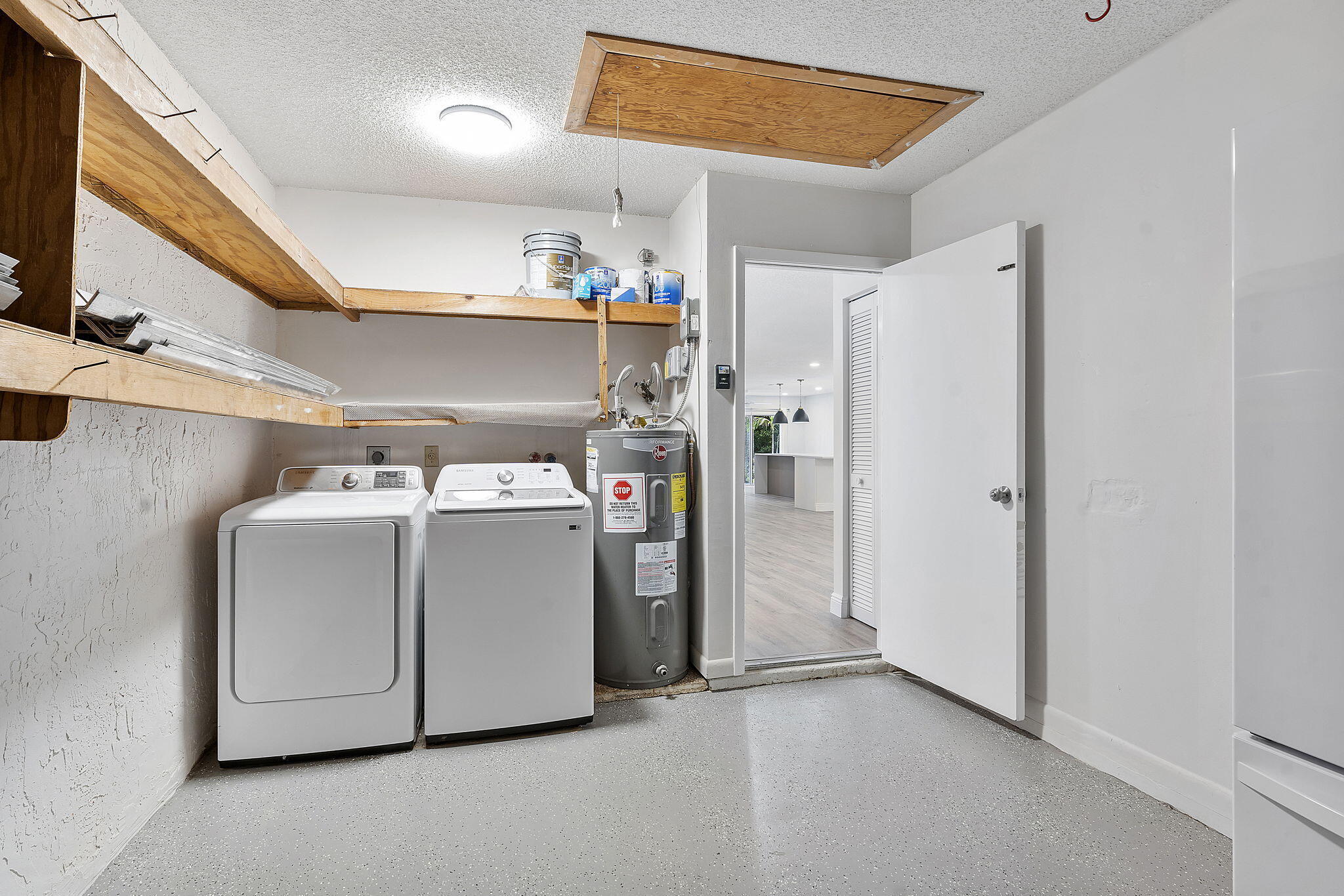 9180 Pine Springs Drive Boca Raton, FL 33428 - Photo 24 of 29 a utility room with refrigerator and washer