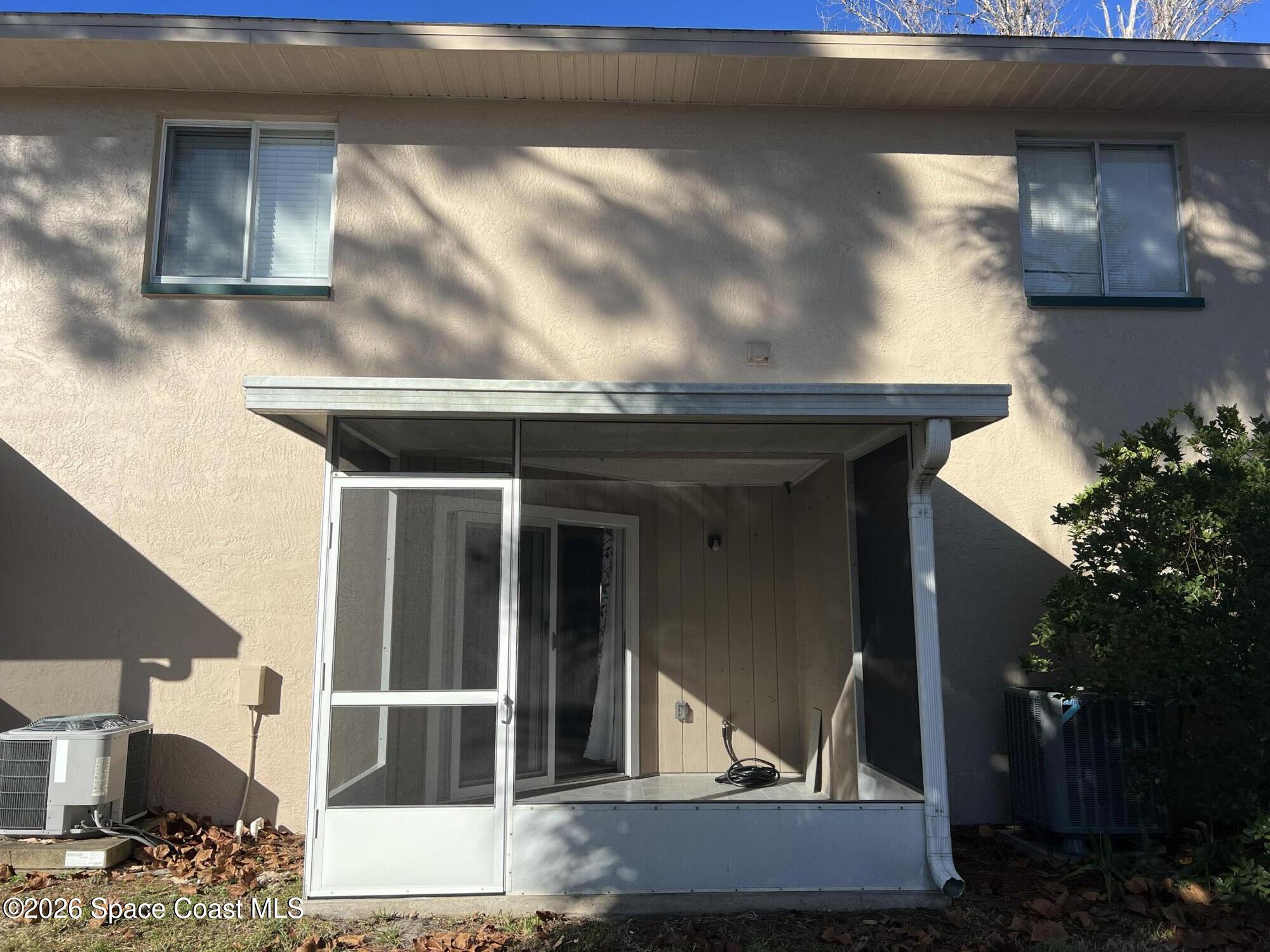1882 Murrell Road, Unit K40 Rockledge, FL 32955 - Photo 12 of 13 a view of house with outdoor space