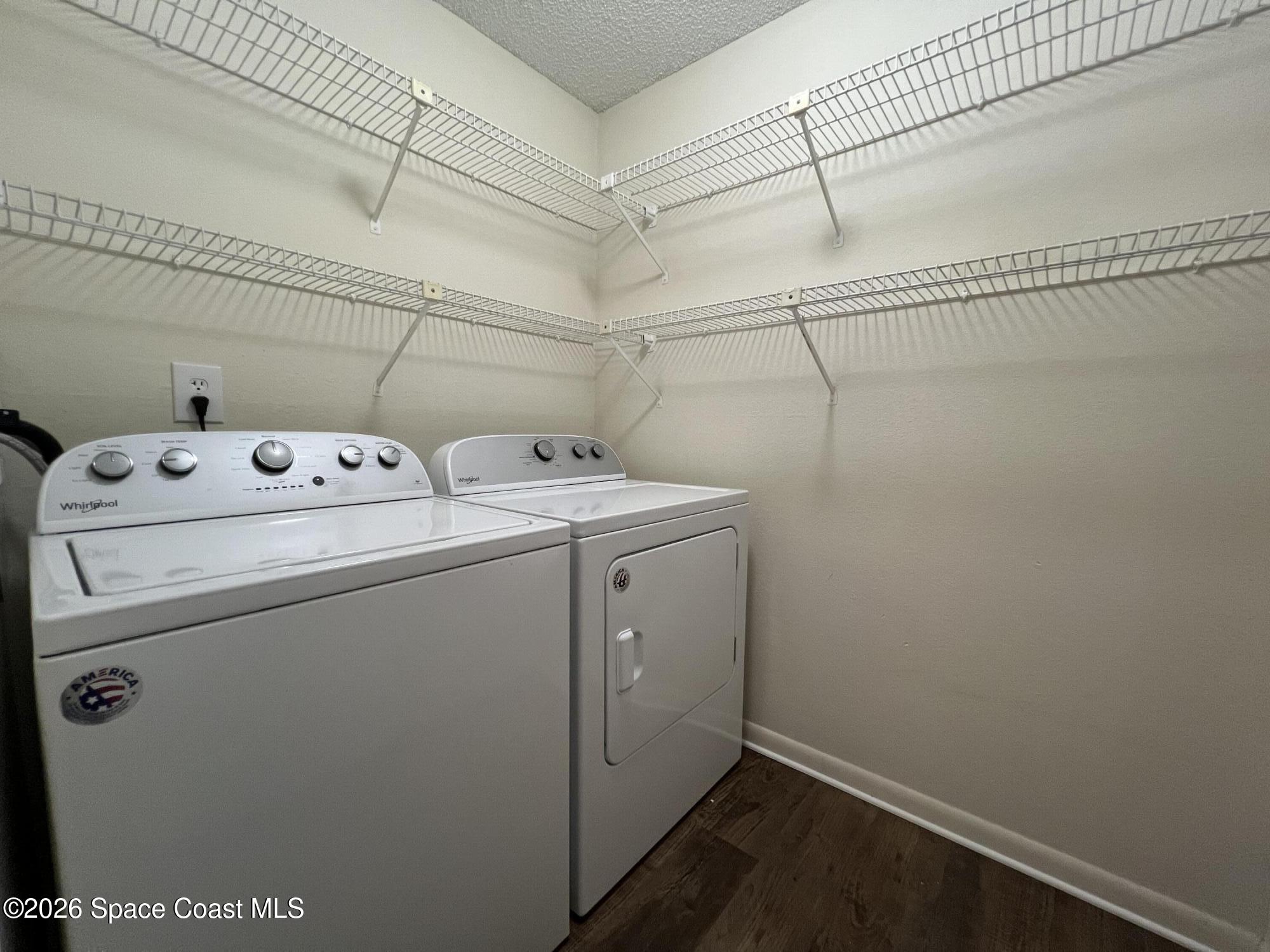 1882 Murrell Road, Unit K40 Rockledge, FL 32955 - Photo 10 of 13 a utility room with dryer and washer