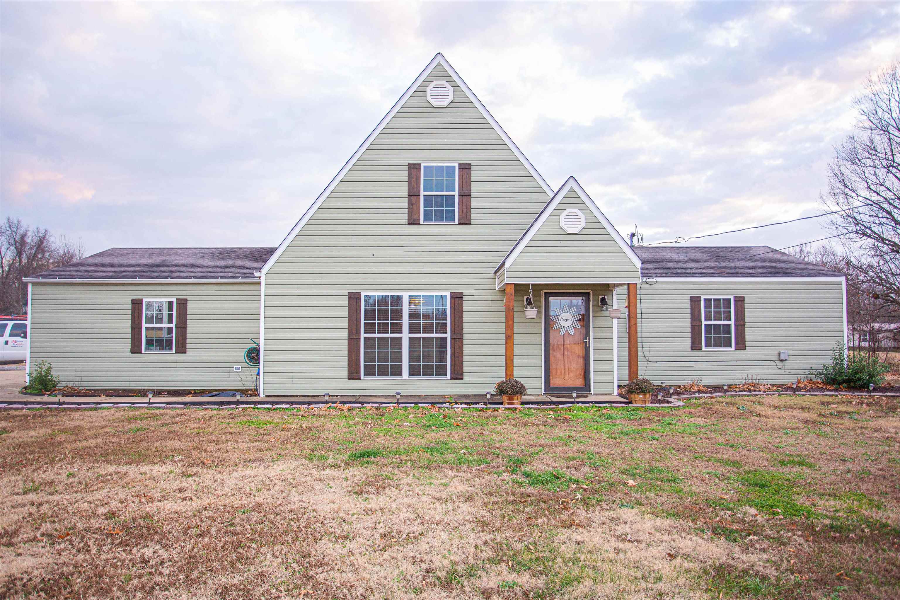 2745 Dry Hill Road West Ripley, TN 38063 - Photo 1 of 23 a front view of house with yard