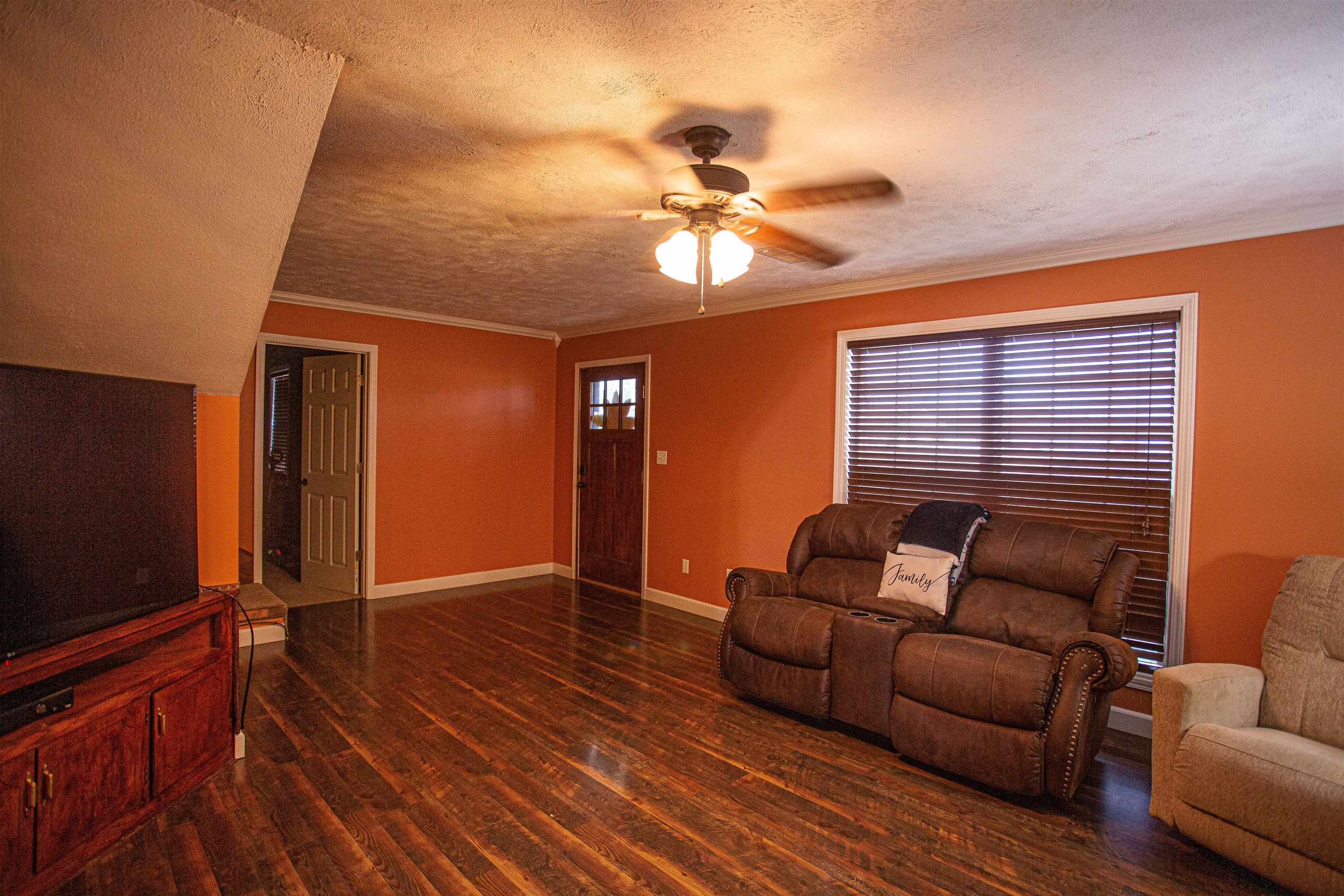 2745 Dry Hill Road West Ripley, TN 38063 - Photo 2 of 23 a living room with furniture and a flat screen tv