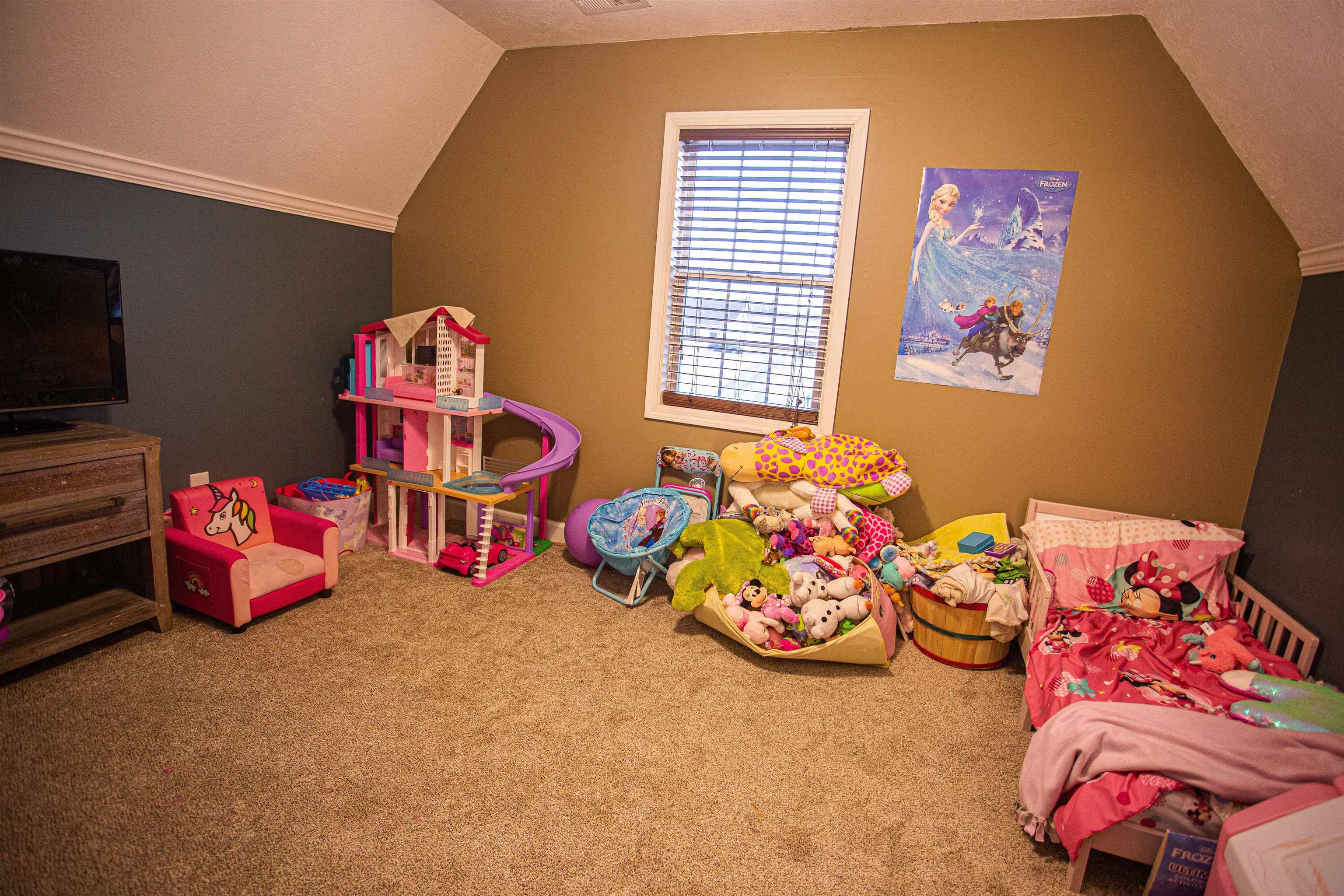 2745 Dry Hill Road West Ripley, TN 38063 - Photo 12 of 23 a bedroom with toys and a bed