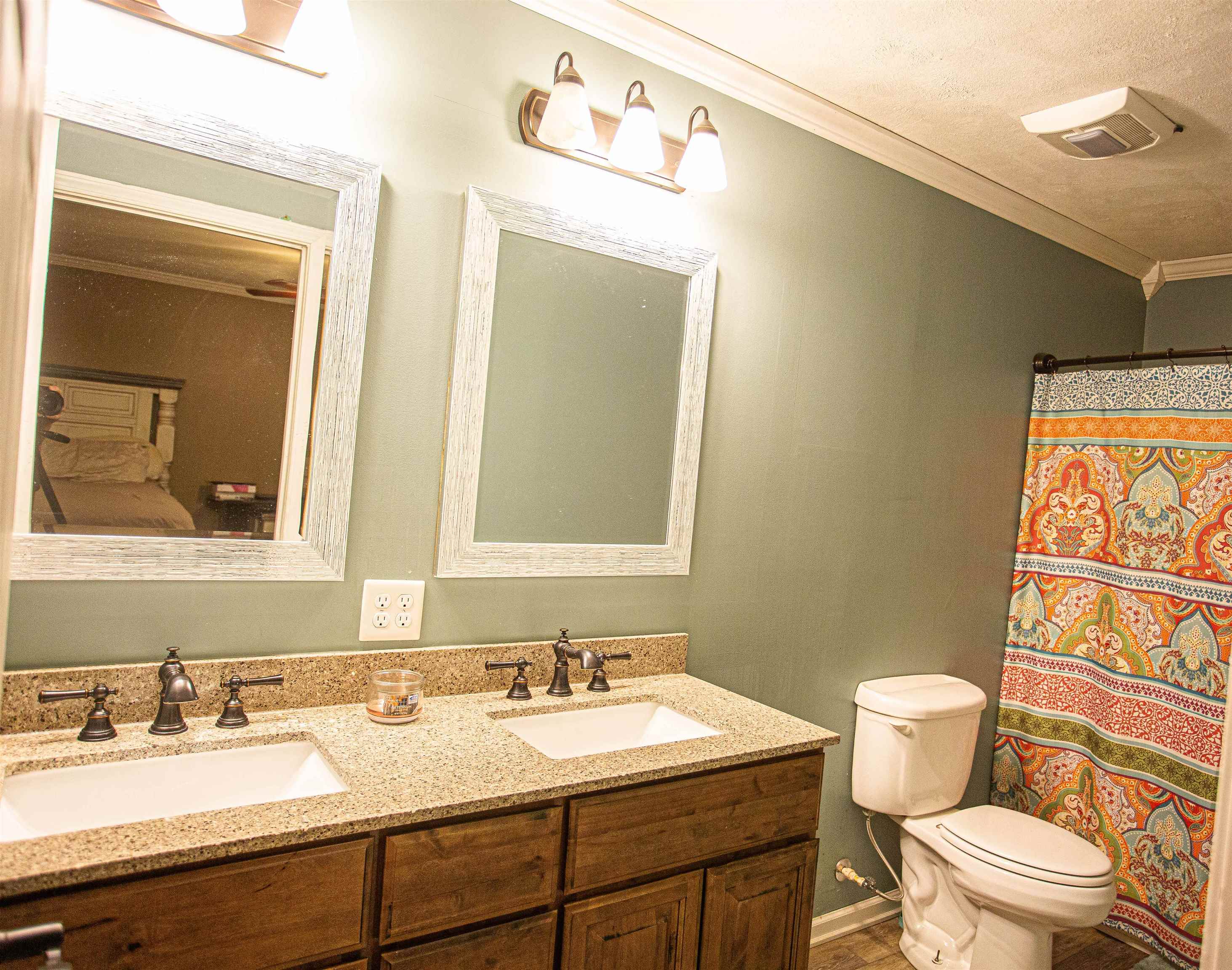 2745 Dry Hill Road West Ripley, TN 38063 - Photo 16 of 23 a bathroom with a toilet sink and mirror