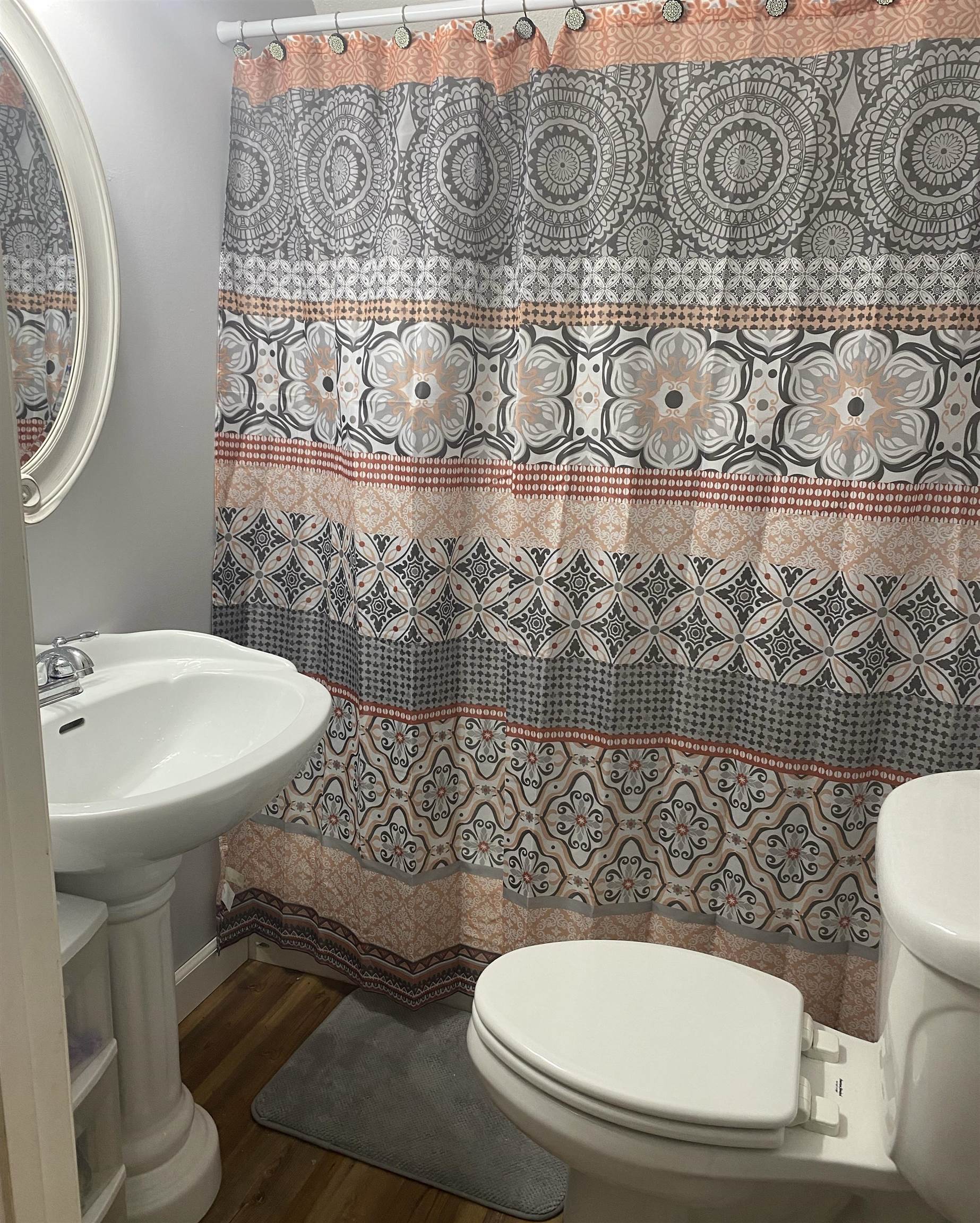 2745 Dry Hill Road West Ripley, TN 38063 - Photo 17 of 23 a bathroom with a toilet sink and mirror