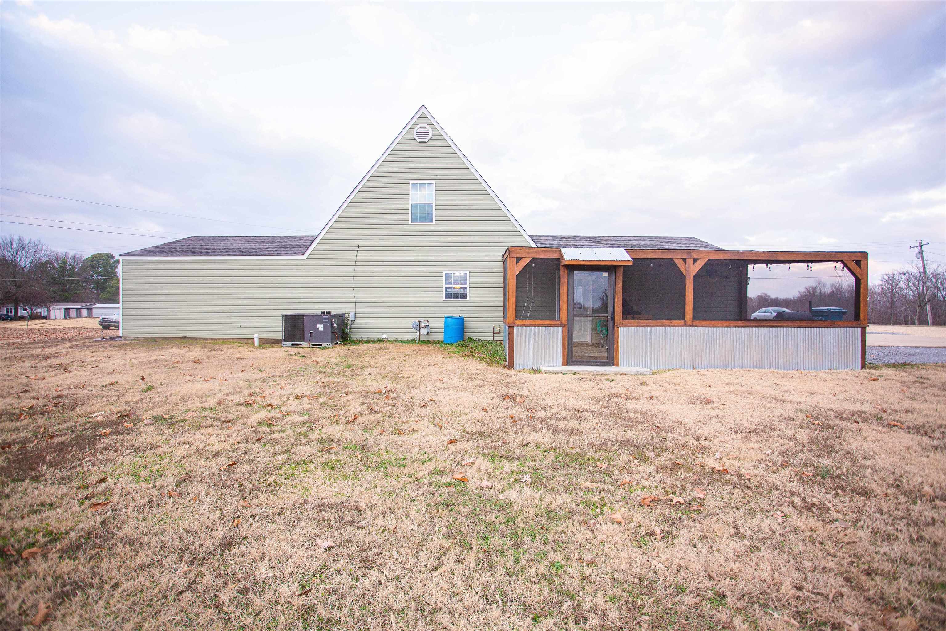 2745 Dry Hill Road West Ripley, TN 38063 - Photo 19 of 23 a view of a house with a yard