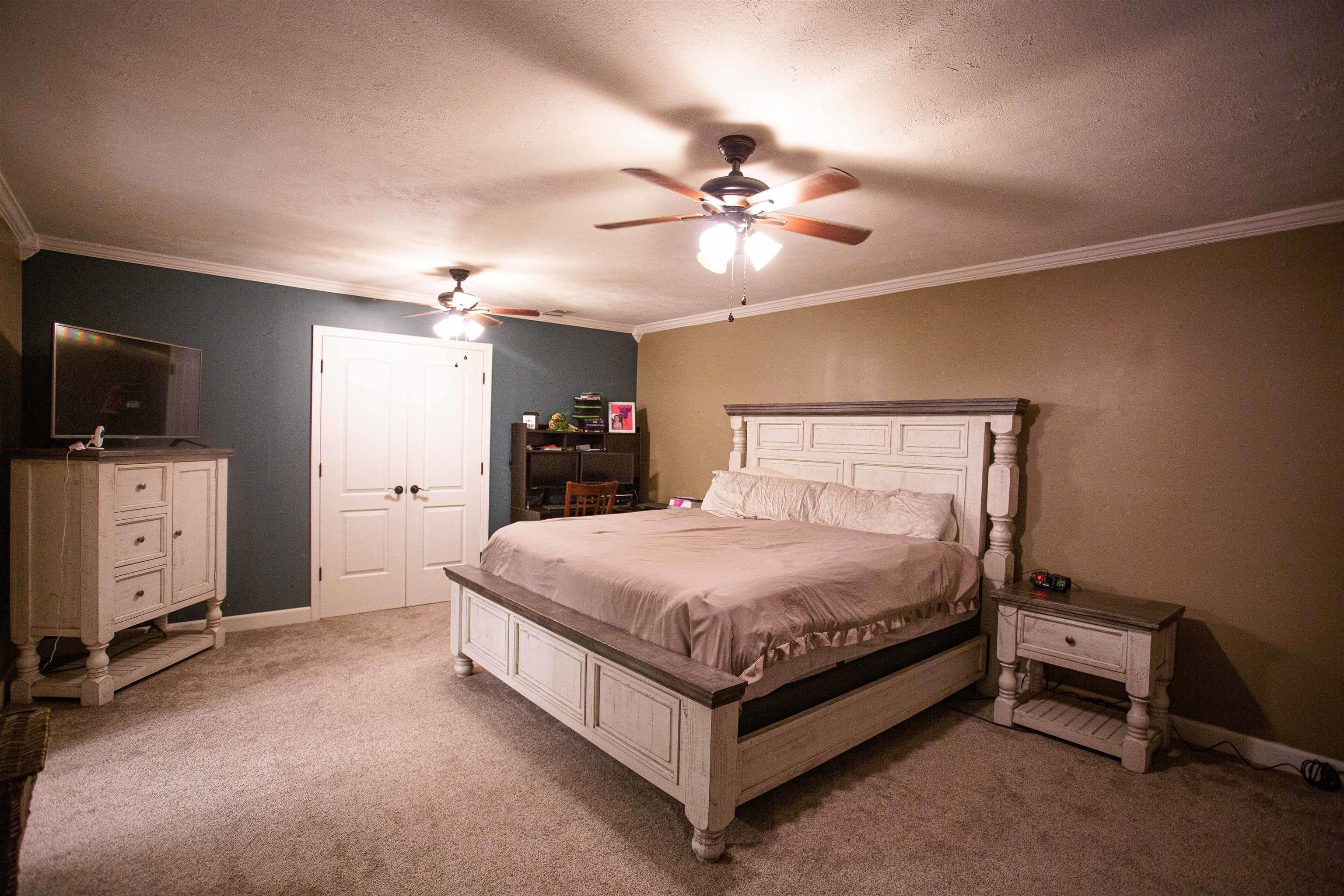 2745 Dry Hill Road West Ripley, TN 38063 - Photo 7 of 23 a bed room with a bed and a television