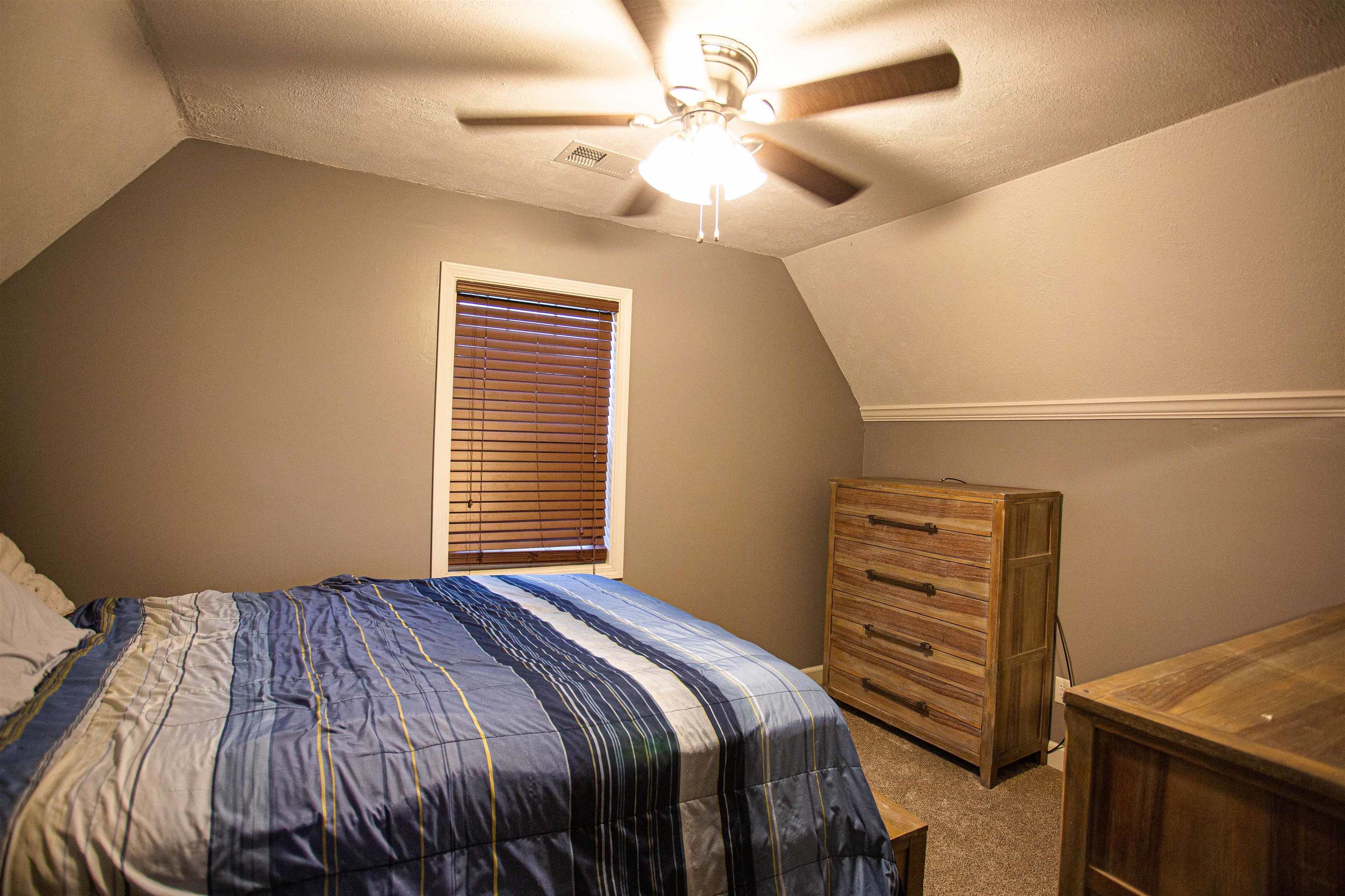 2745 Dry Hill Road West Ripley, TN 38063 - Photo 10 of 23 a bedroom with a bed and a ceiling fan