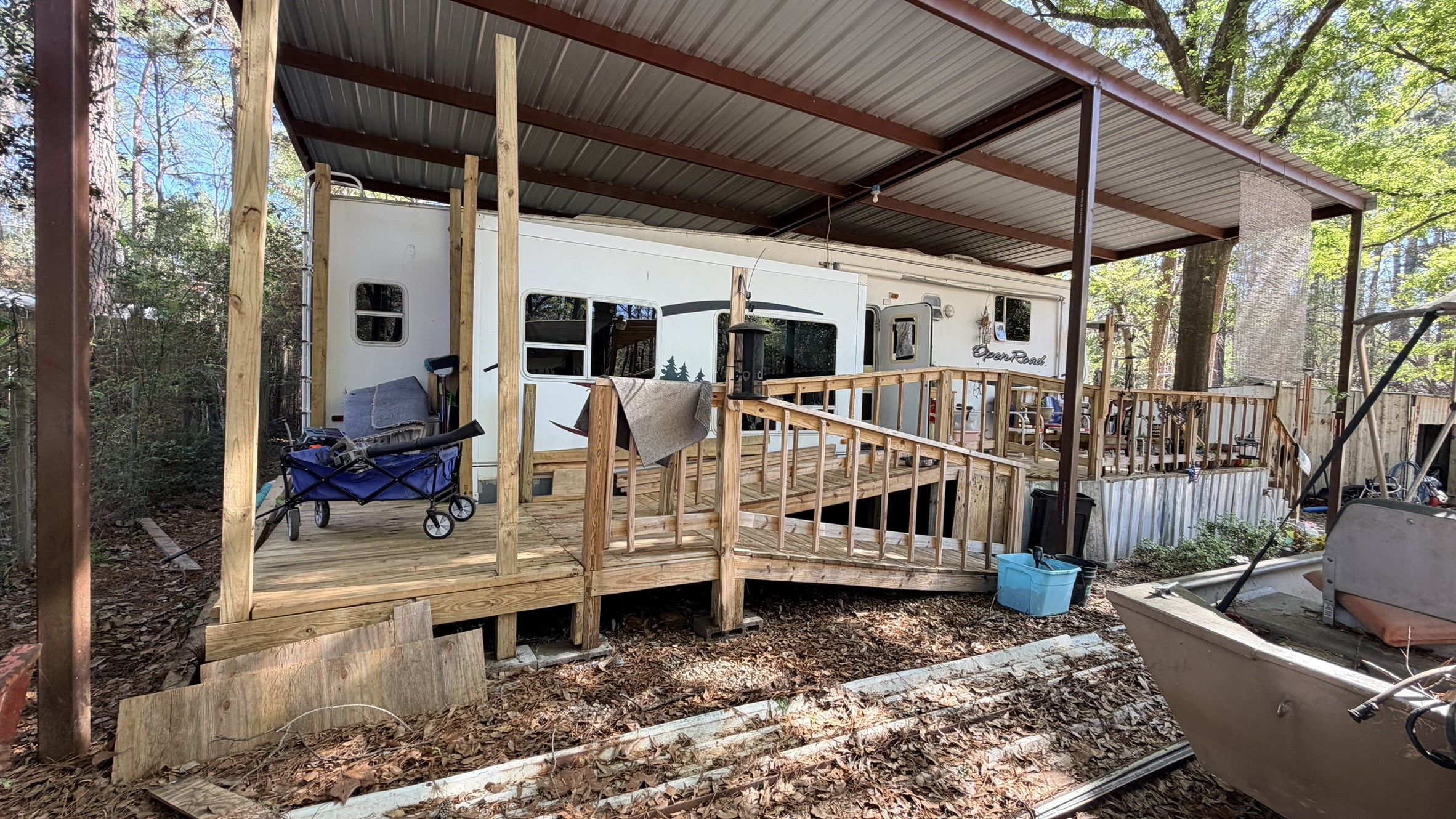 361 Medina Drive Trinity, TX 75862 - Photo 19 of 46 a view of a house with a wooden deck