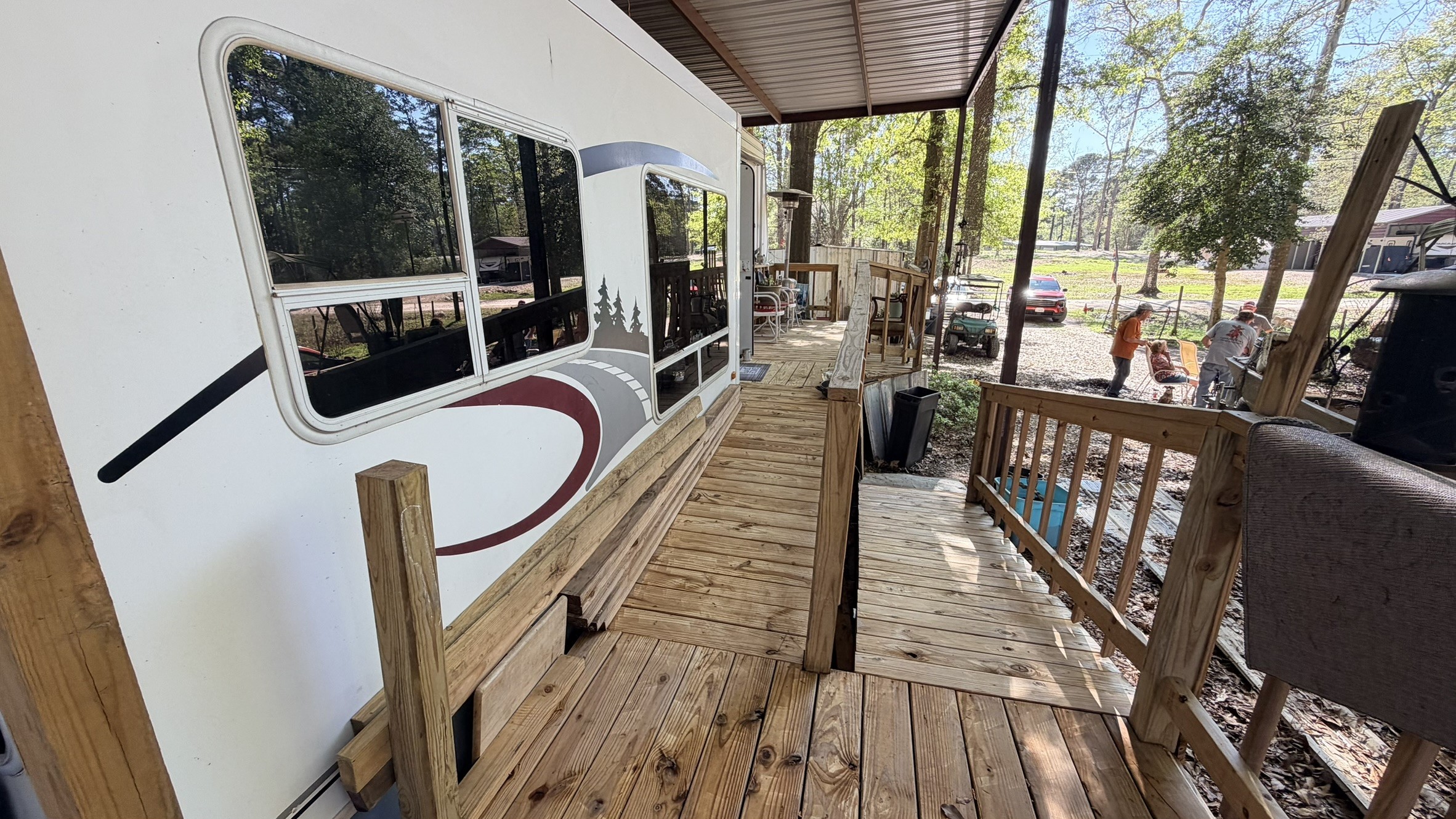 361 Medina Drive Trinity, TX 75862 - Photo 21 of 46 a view of a balcony with chairs