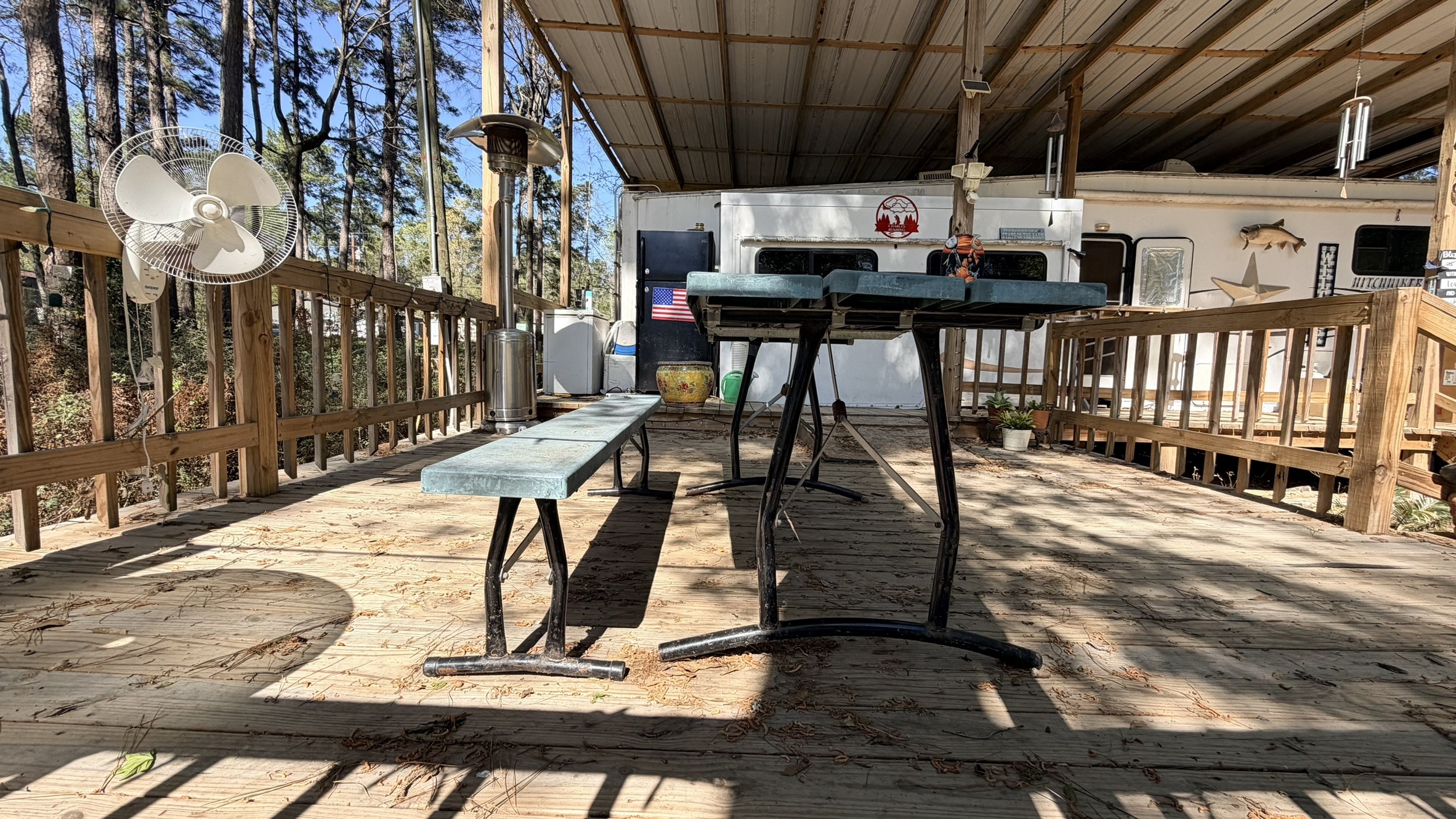 361 Medina Drive Trinity, TX 75862 - Photo 6 of 46 a view of a patio with table and chairs