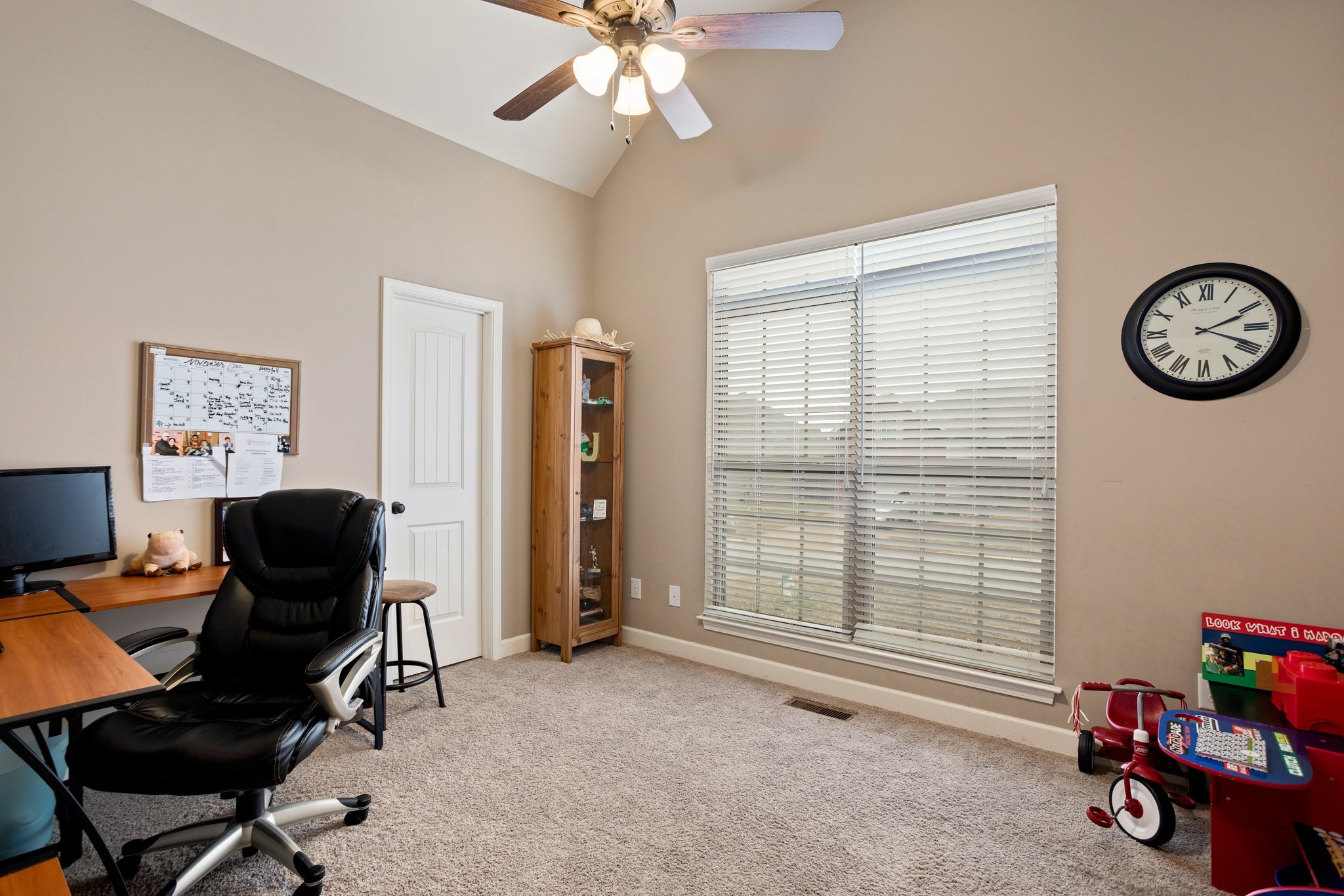 1086 Golf View Way Spring Hill, TN 37174 - Photo 18 of 25 a view of a workspace with furniture and a window