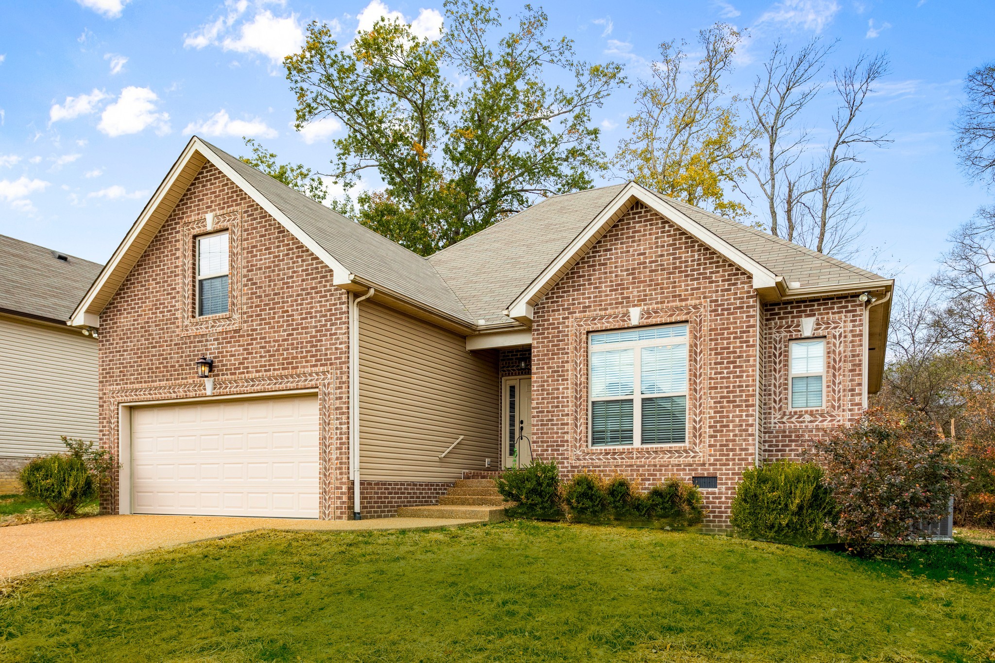 1086 Golf View Way Spring Hill, TN 37174 - Photo 2 of 25 a front view of house with yard and green space