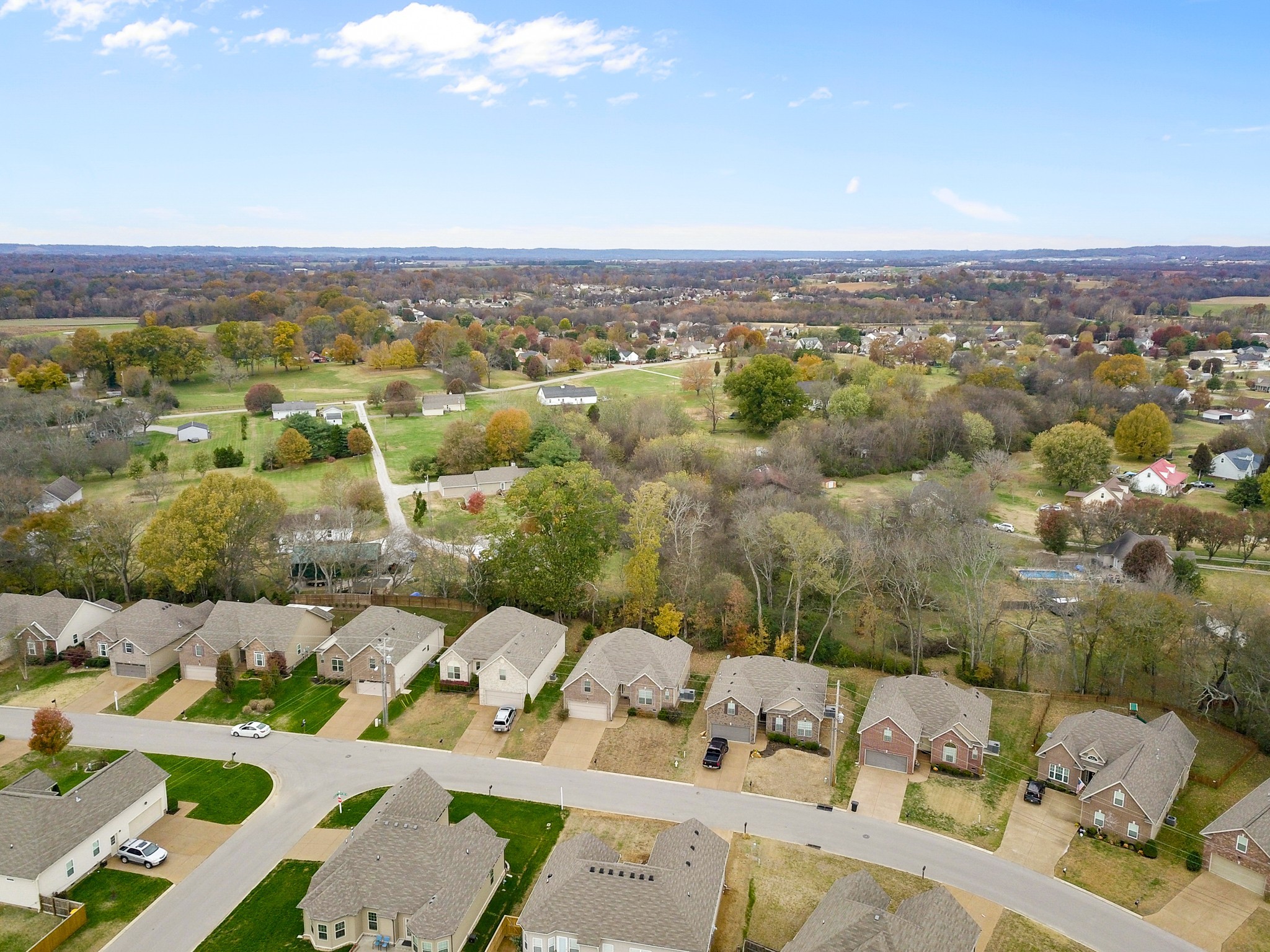 1086 Golf View Way Spring Hill, TN 37174 - Photo 25 of 25 an aerial view of a city with lots of residential buildings