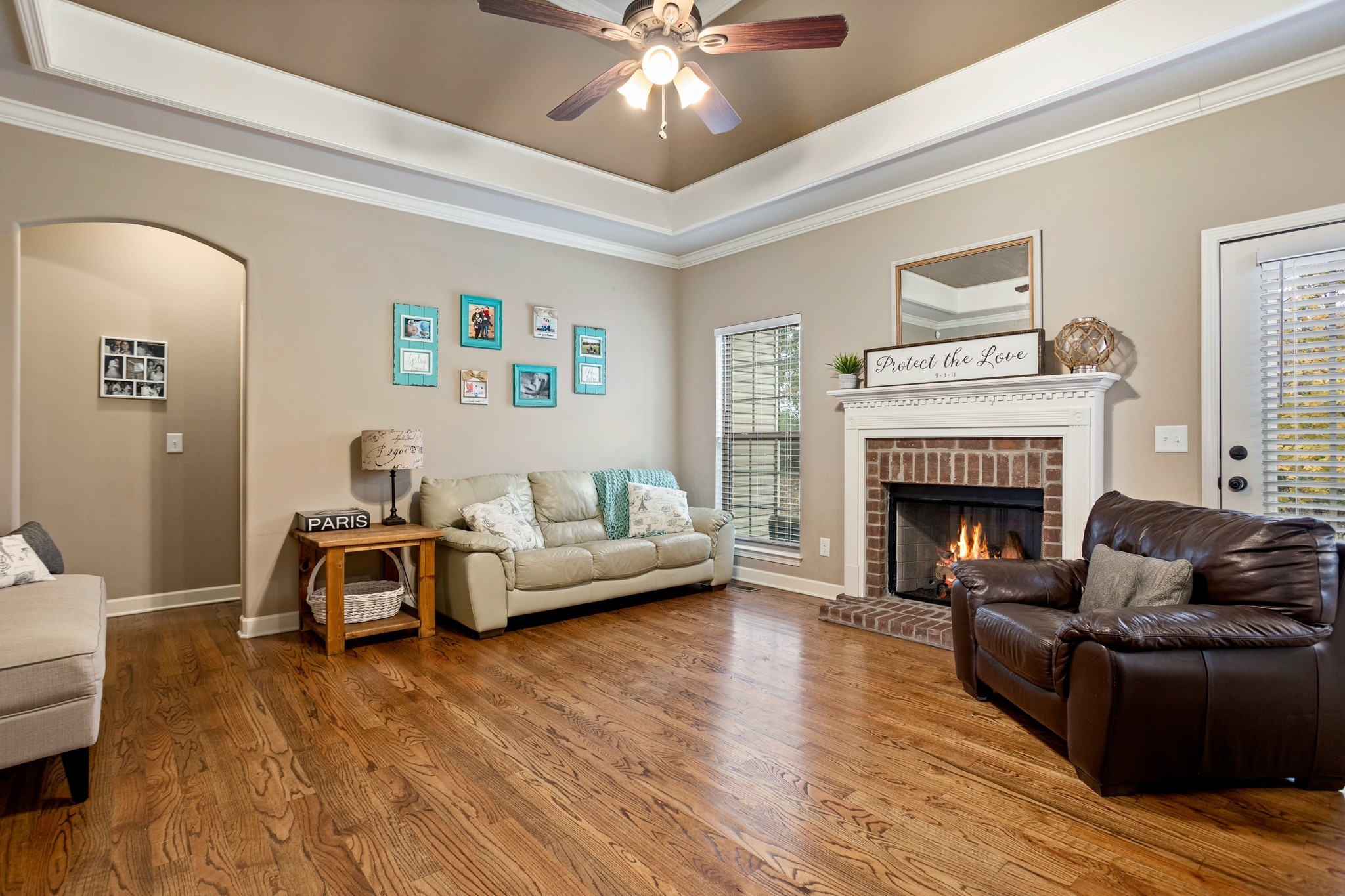 1086 Golf View Way Spring Hill, TN 37174 - Photo 5 of 25 a living room with furniture and a fireplace