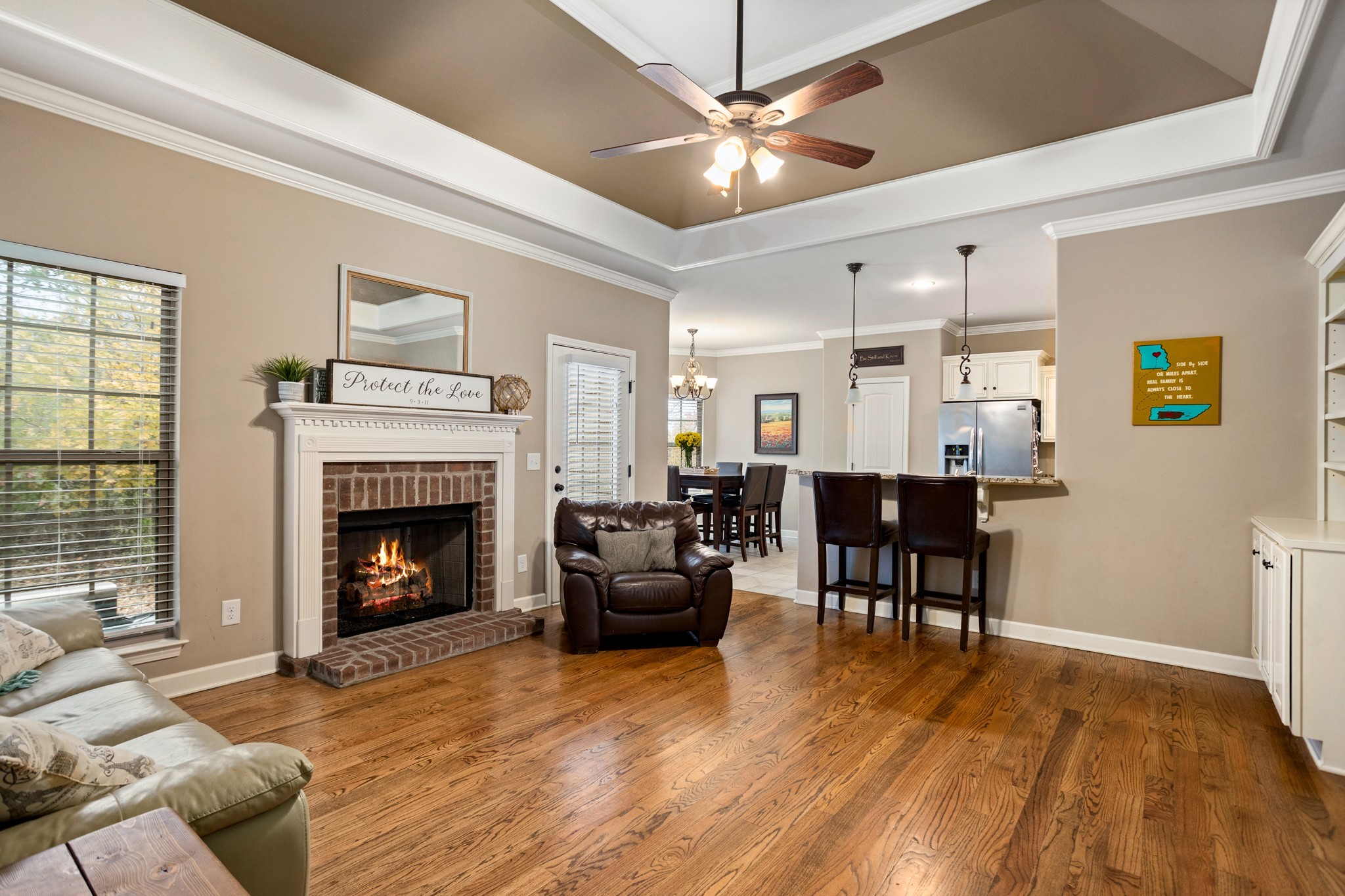 1086 Golf View Way Spring Hill, TN 37174 - Photo 6 of 25 a living room with furniture and a fireplace