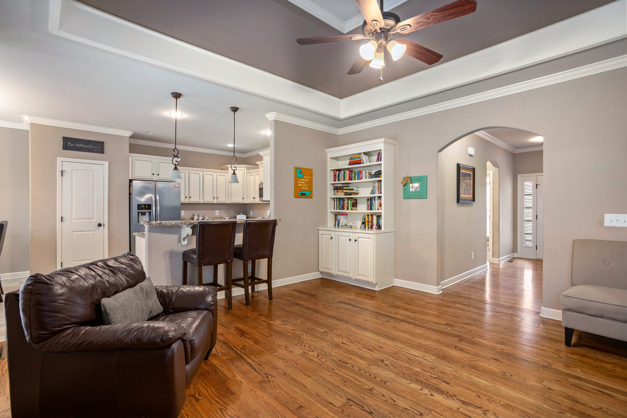 1086 Golf View Way Spring Hill, TN 37174 - Photo 7 of 25 a living room with furniture and kitchen view