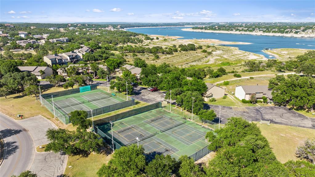 18804 Venture Drive Point Venture, TX 78645 - Photo 13 of 24 an aerial view of residential houses with outdoor space and river