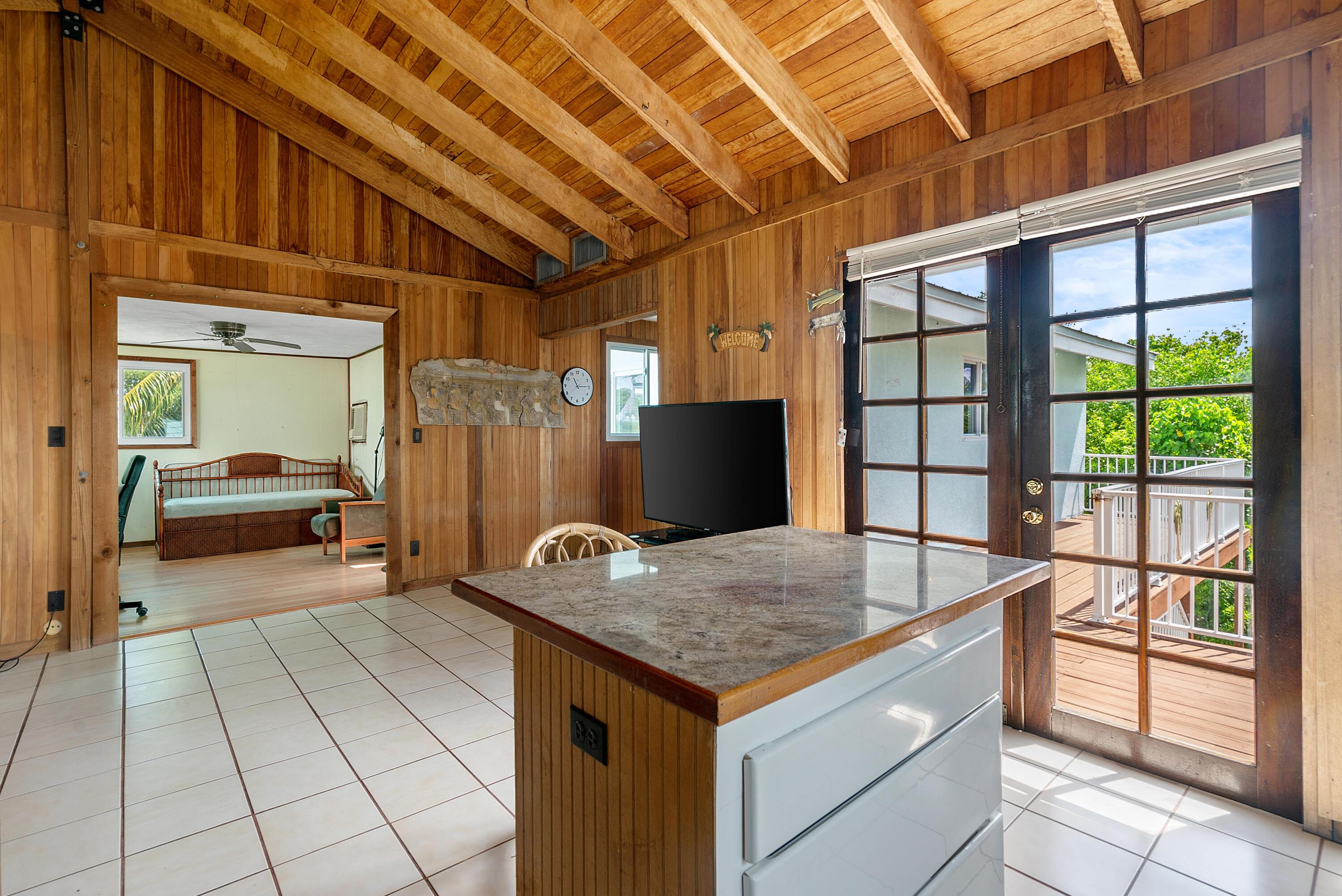 18 North Channel Drive Key Largo, FL 33037 - Photo 10 of 40 a view of a living room and bathroom