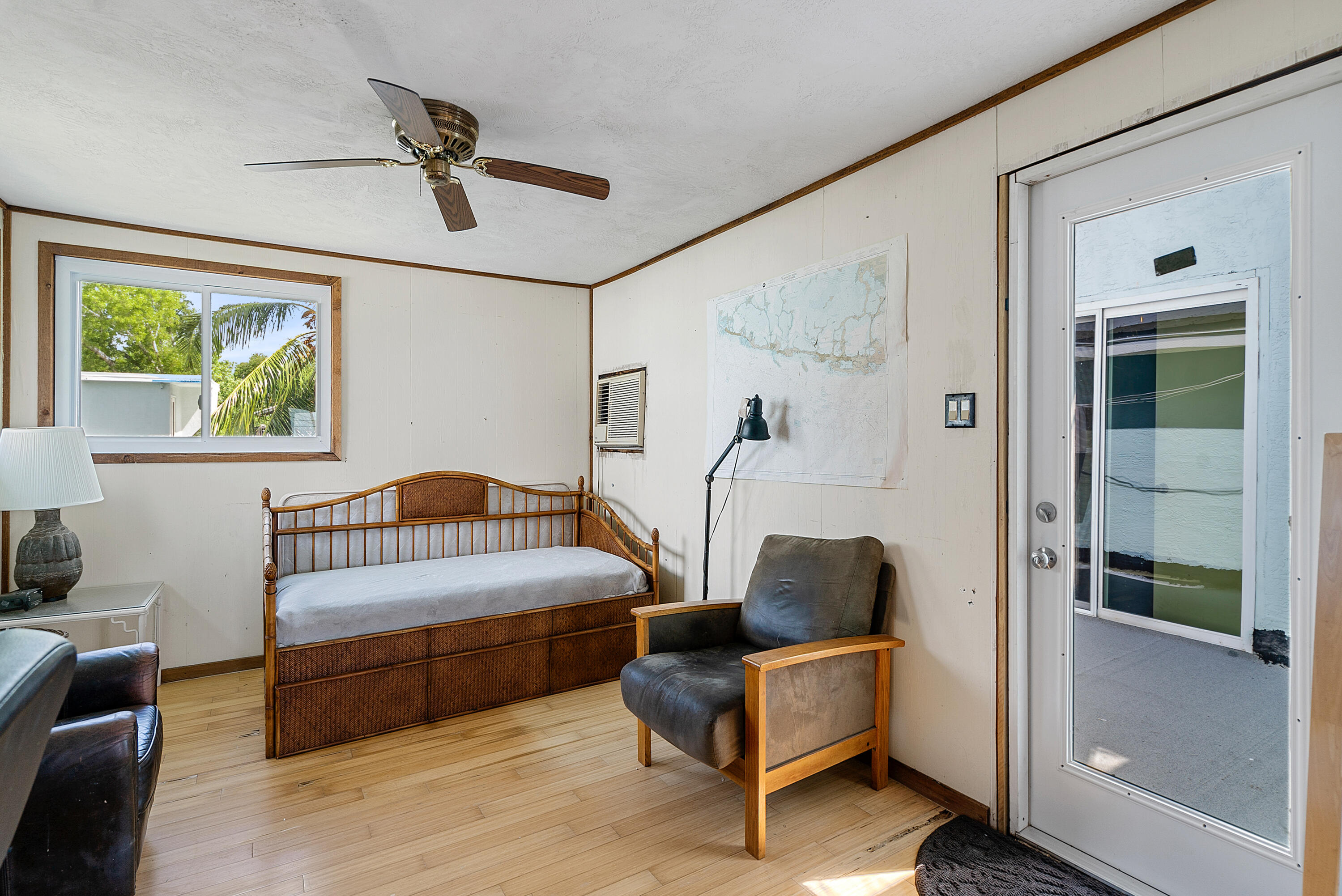 18 North Channel Drive Key Largo, FL 33037 - Photo 12 of 40 a bedroom with furniture and a window