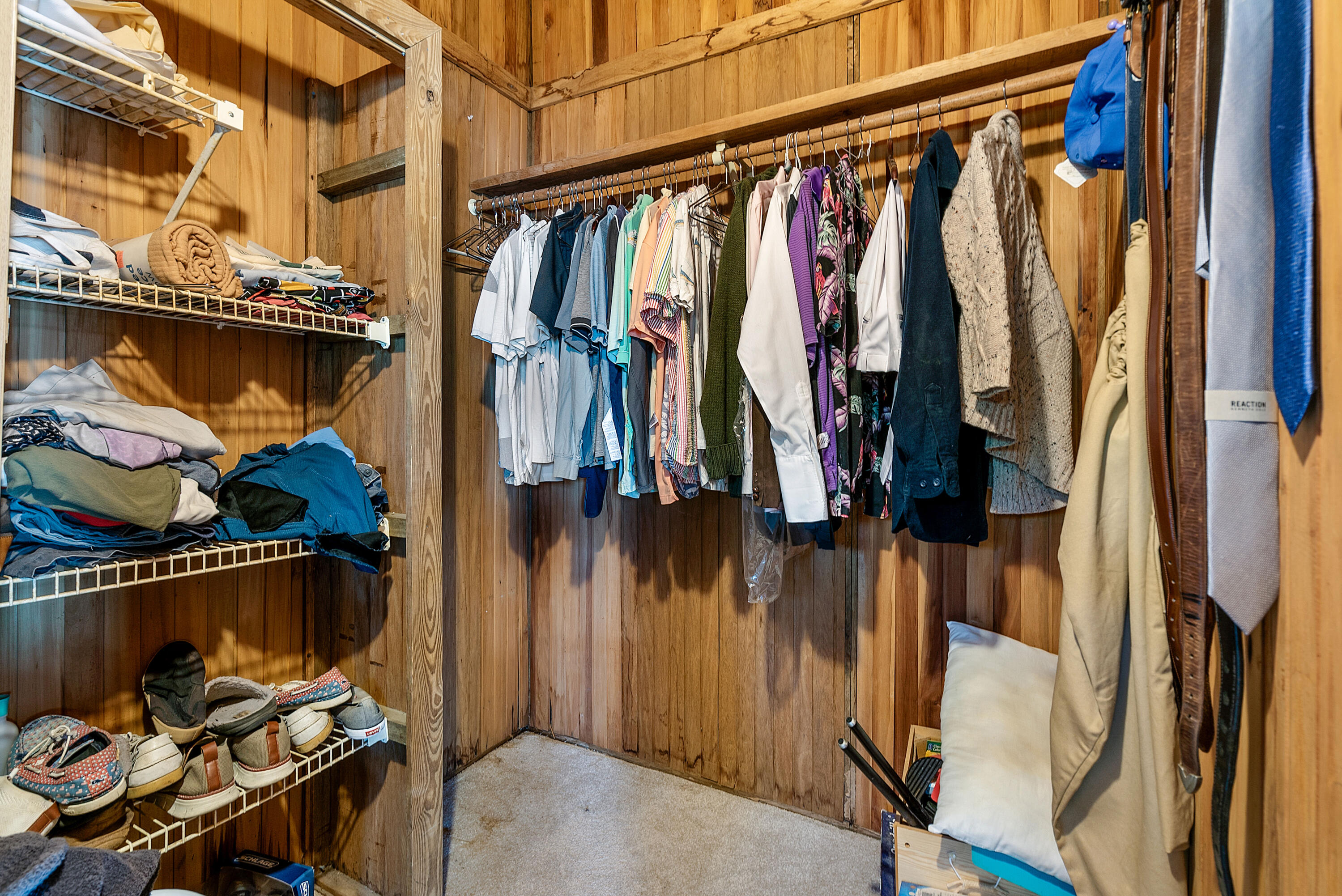 18 North Channel Drive Key Largo, FL 33037 - Photo 16 of 40 a view of walk in closet with clothes and shoes