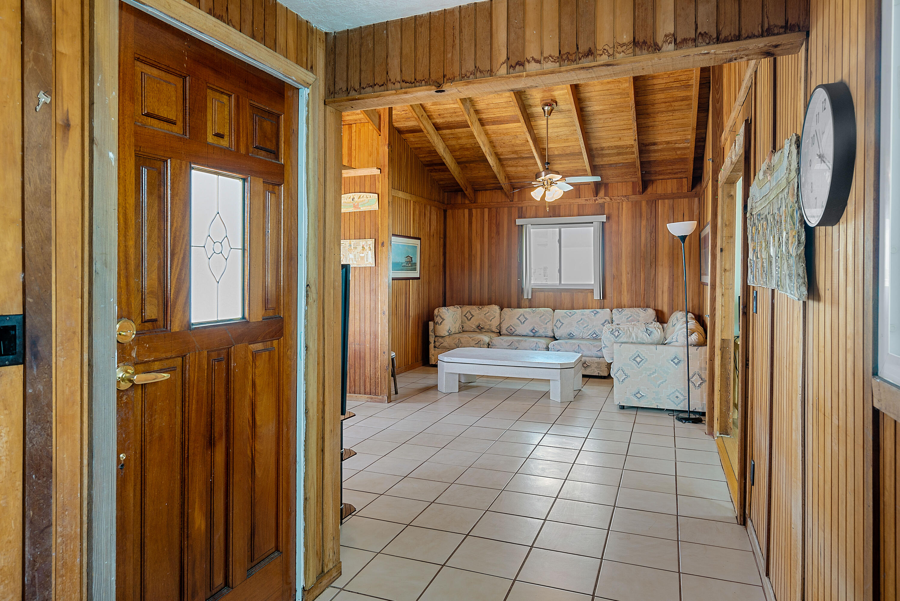18 North Channel Drive Key Largo, FL 33037 - Photo 19 of 40 a view of a hallway with dining room and chandelier