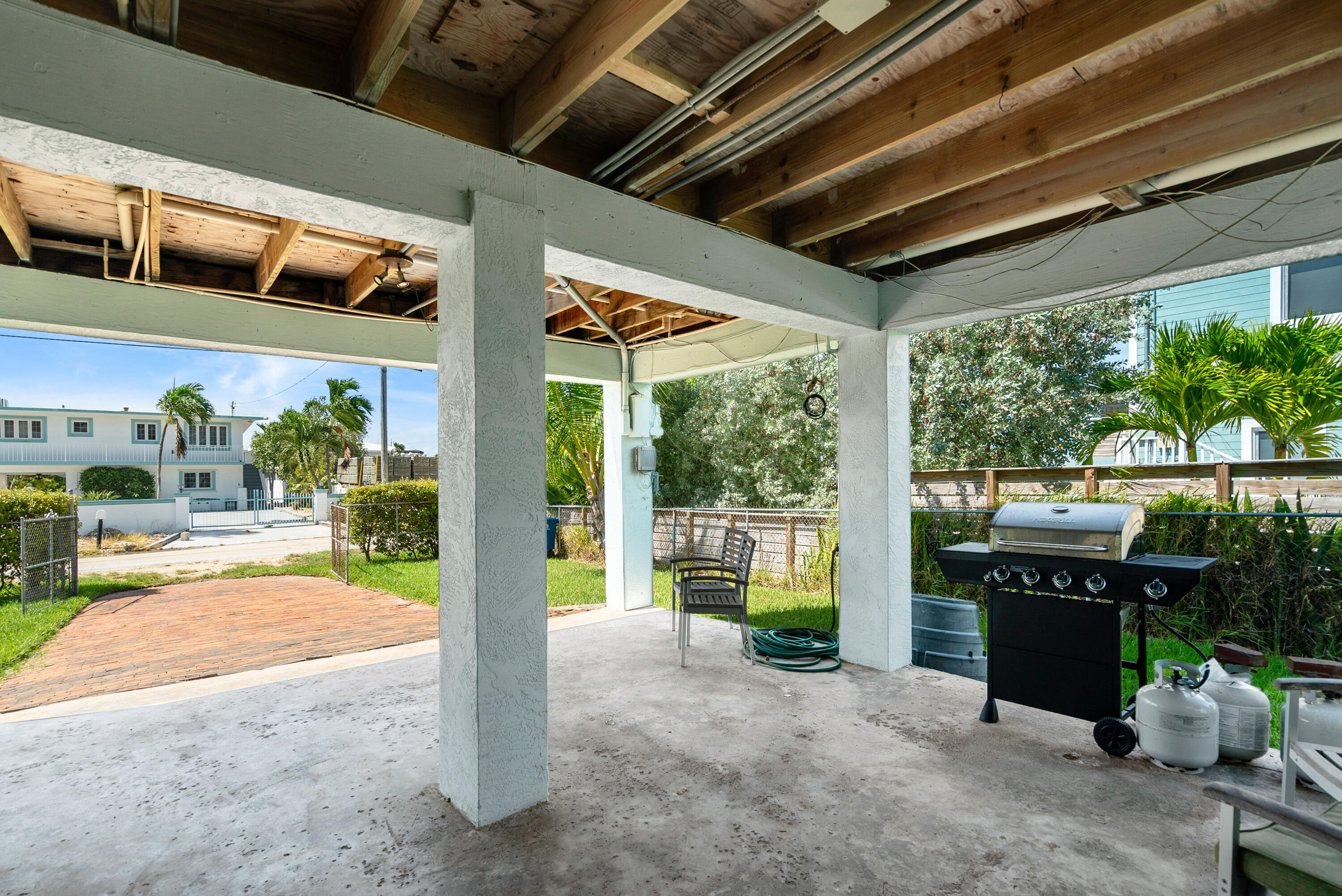 18 North Channel Drive Key Largo, FL 33037 - Photo 20 of 40 a view of a porch with furniture and garden