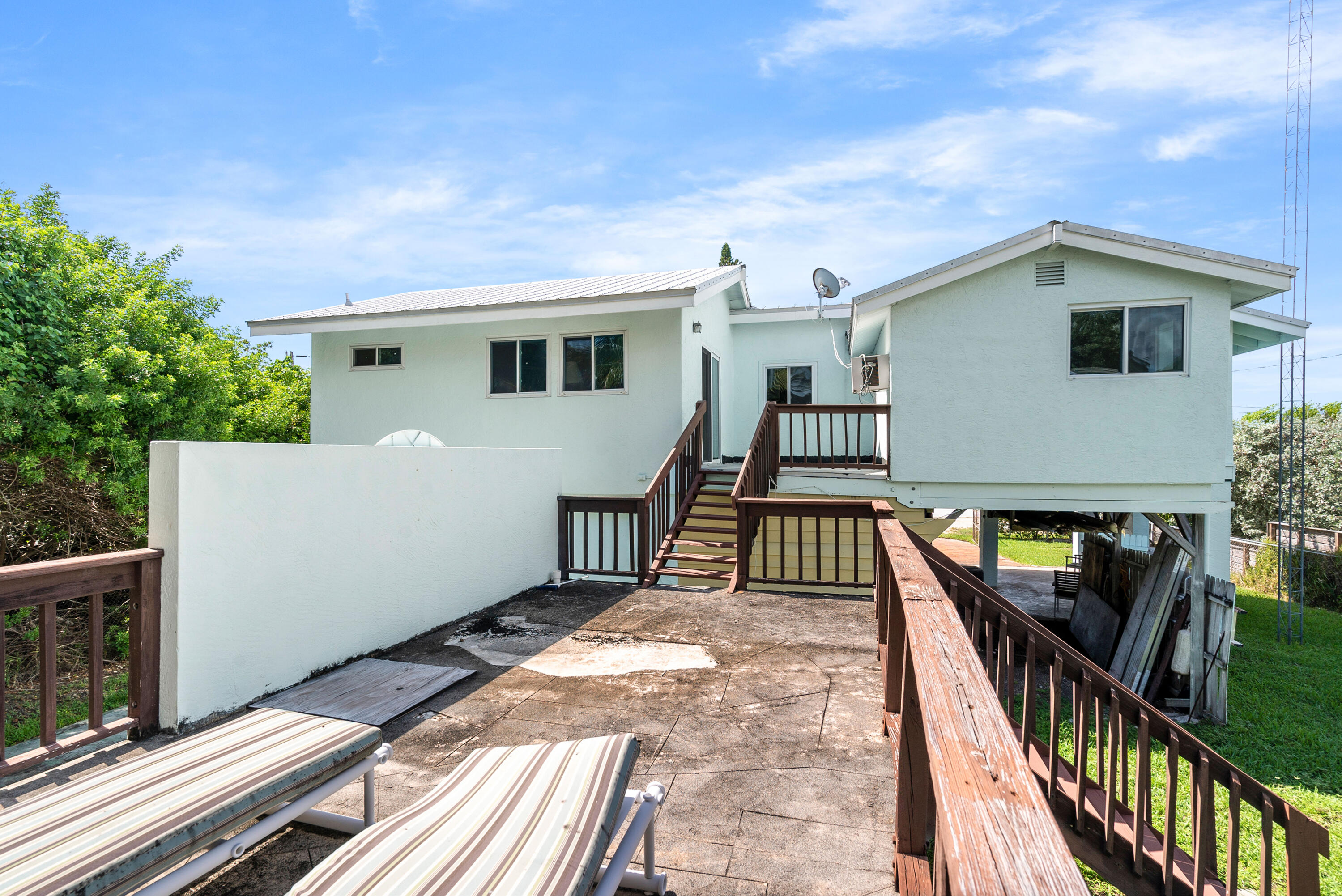 18 North Channel Drive Key Largo, FL 33037 - Photo 22 of 40 a view of a house with backyard and deck