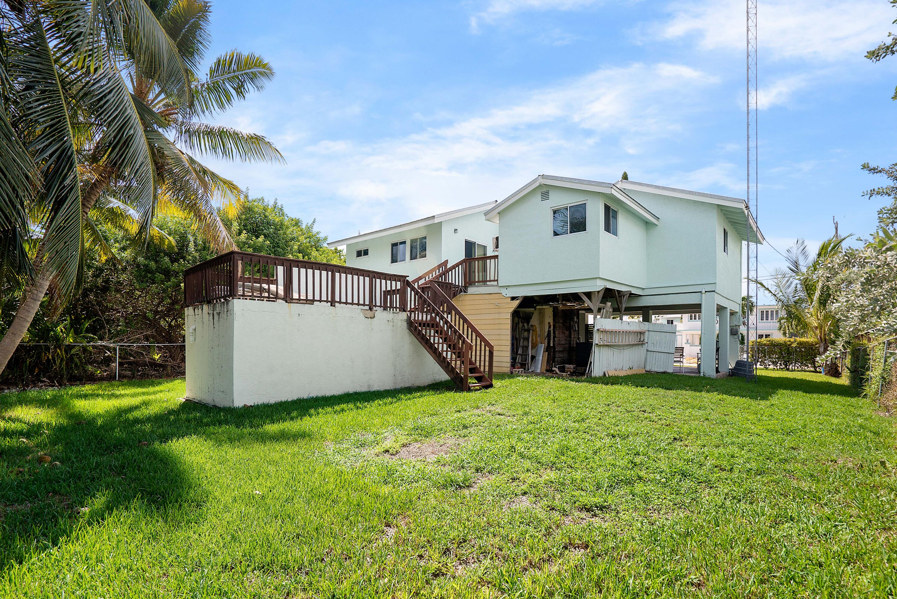 18 North Channel Drive Key Largo, FL 33037 - Photo 23 of 40 a view of a house with a yard