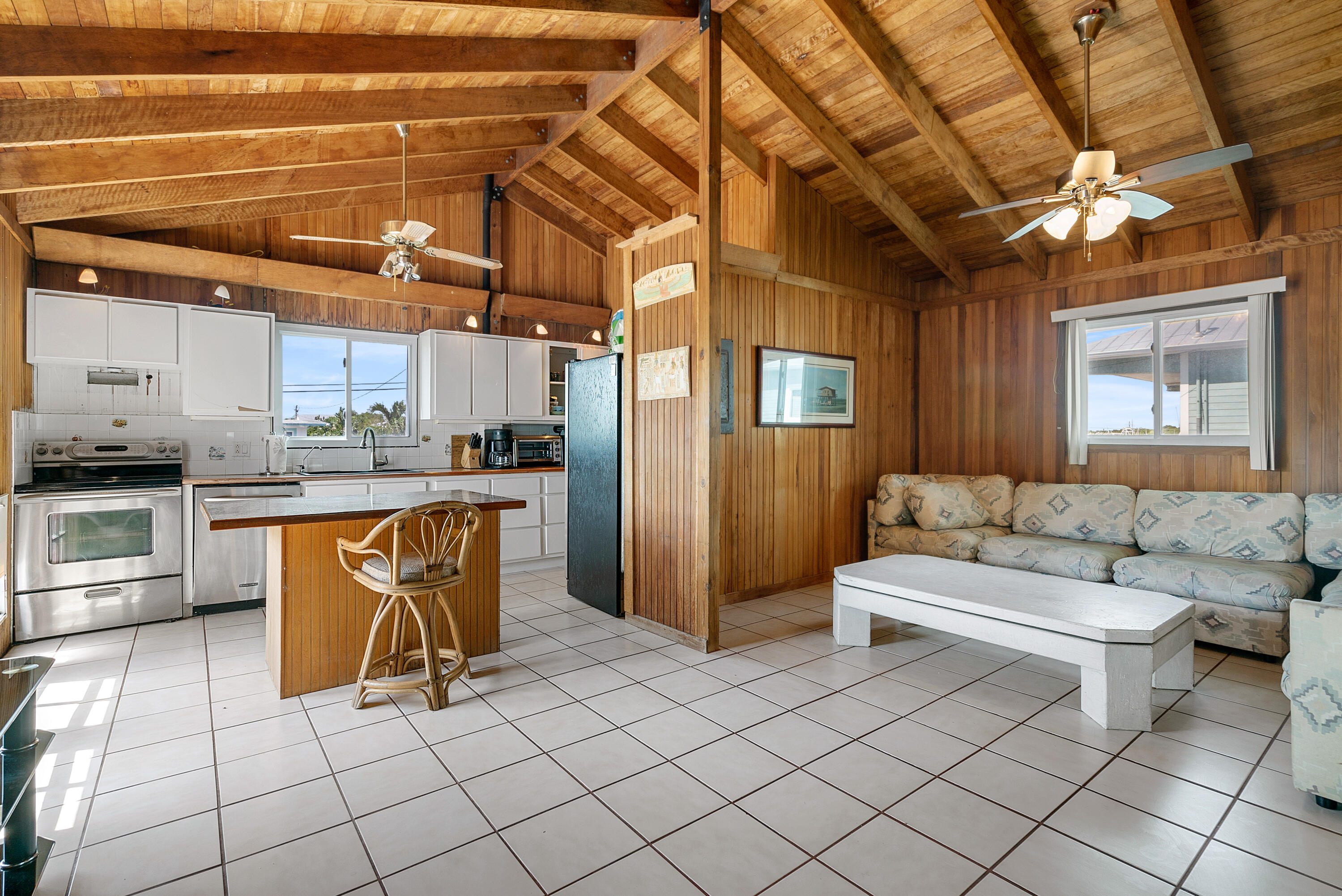 18 North Channel Drive Key Largo, FL 33037 - Photo 40 of 40 a living room with stainless steel appliances kitchen island granite countertop furniture and a kitchen view
