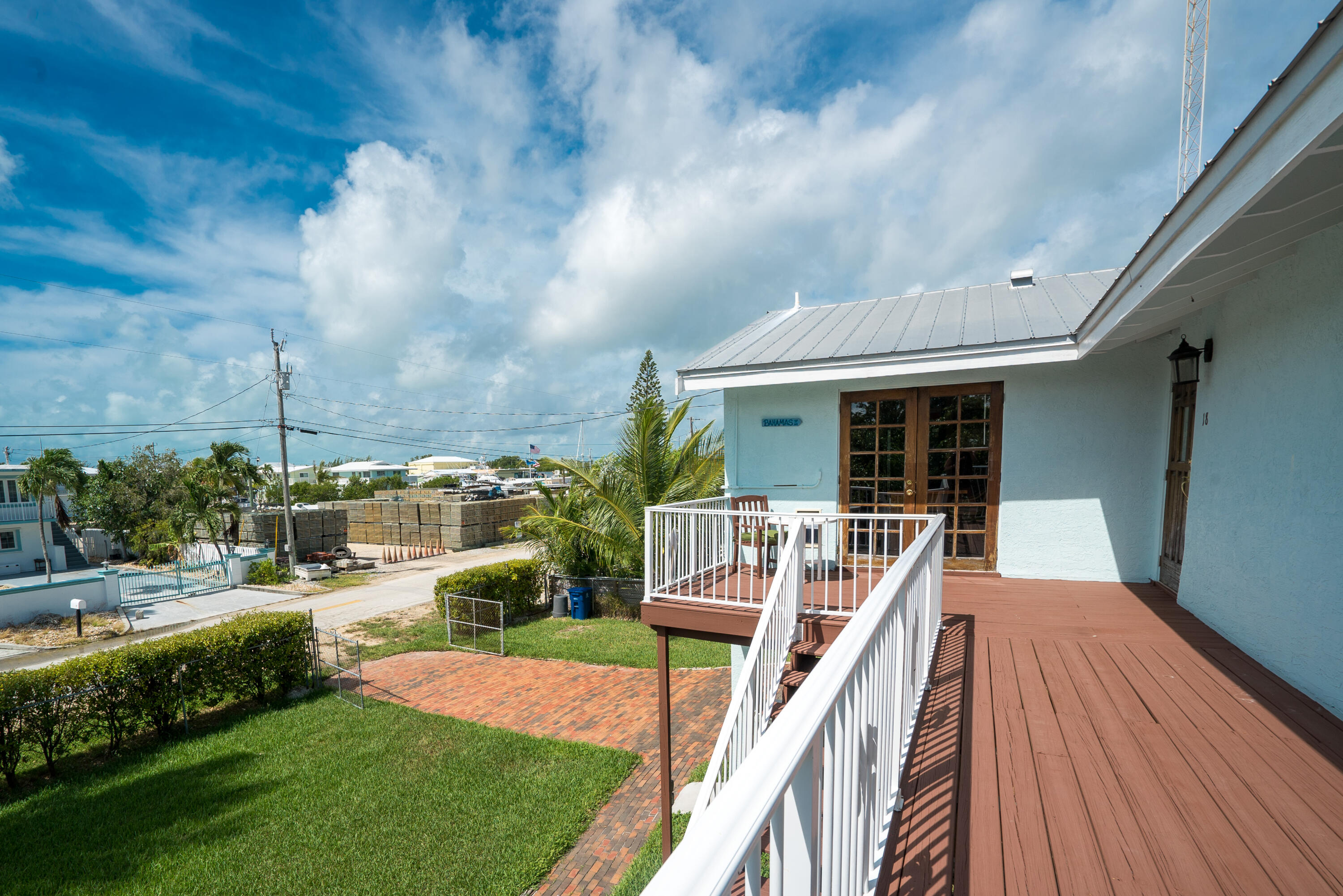 18 North Channel Drive Key Largo, FL 33037 - Photo 38 of 40 a view of a house with backyard porch and sitting area