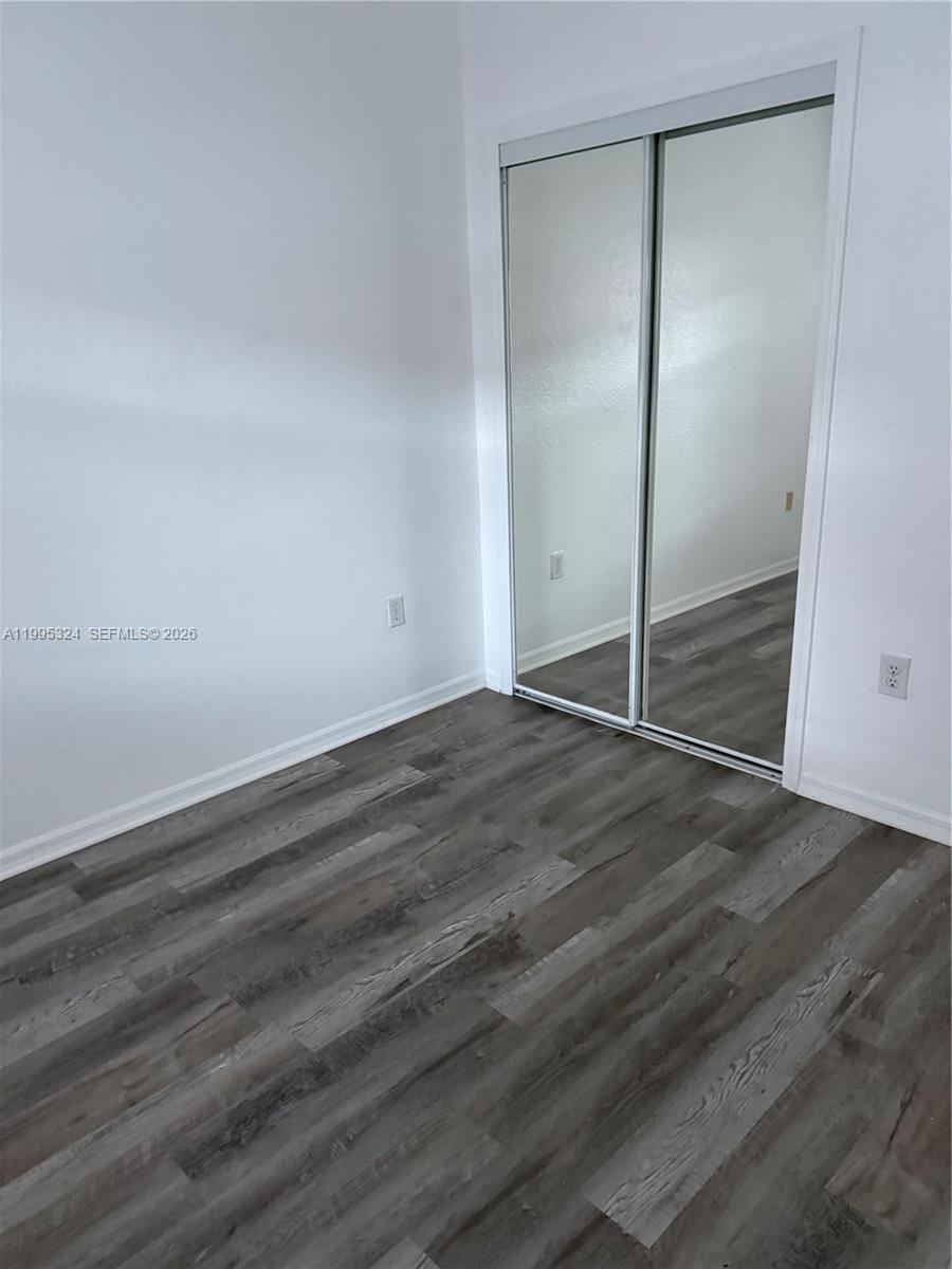 27270 Southwest 138th Court, Unit 1 Homestead, FL 33032 - Photo 4 of 8 a view of an empty room