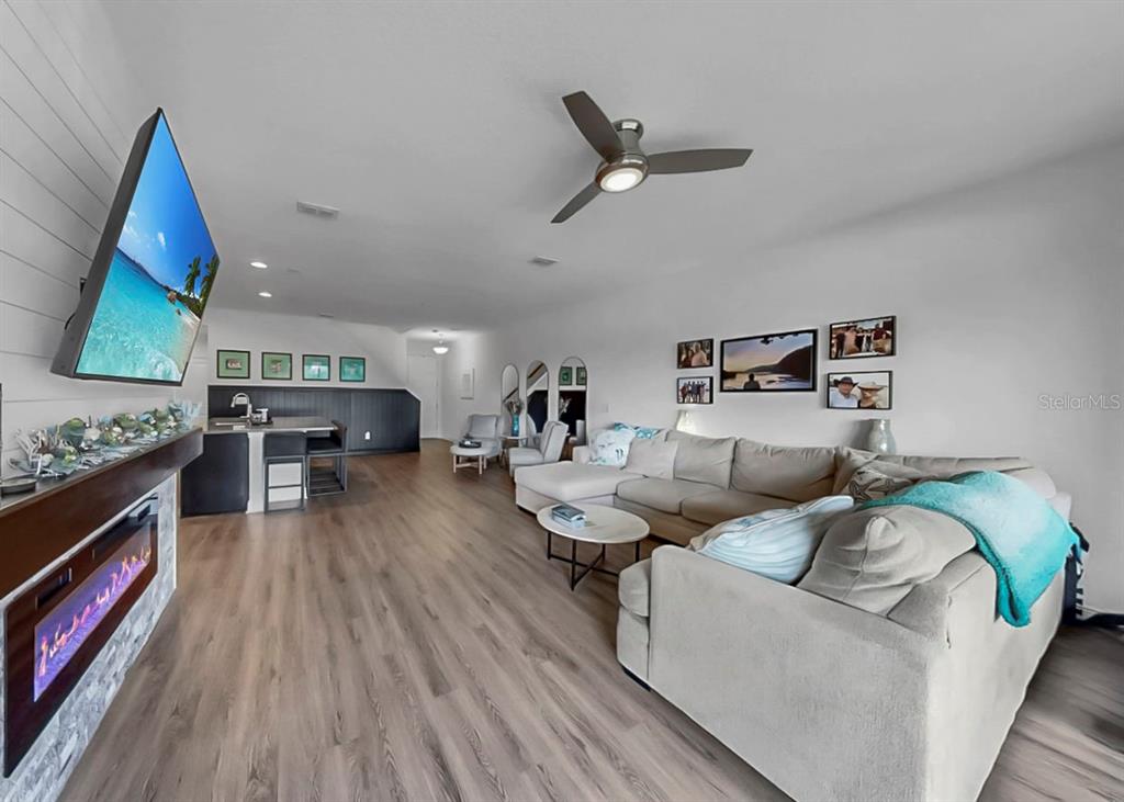 10212 Newel Valley Loop Riverview, FL 33569 - Photo 16 of 72 a living room with furniture and a wooden floor