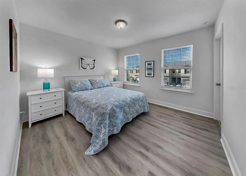 10212 Newel Valley Loop Riverview, FL 33569 - Photo 25 of 72 a bedroom with a large bed and a window