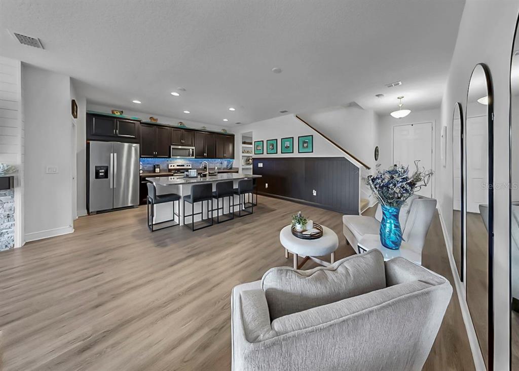 10212 Newel Valley Loop Riverview, FL 33569 - Photo 34 of 72 a living room with furniture and wooden floor