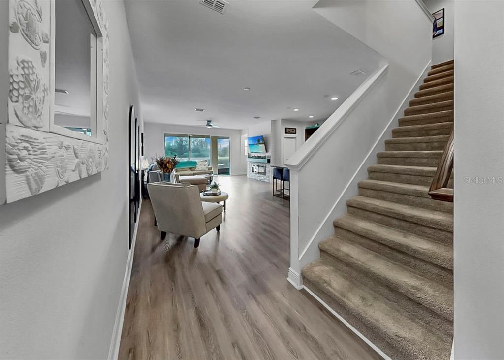 10212 Newel Valley Loop Riverview, FL 33569 - Photo 37 of 72 a living room with furniture and a wooden floor