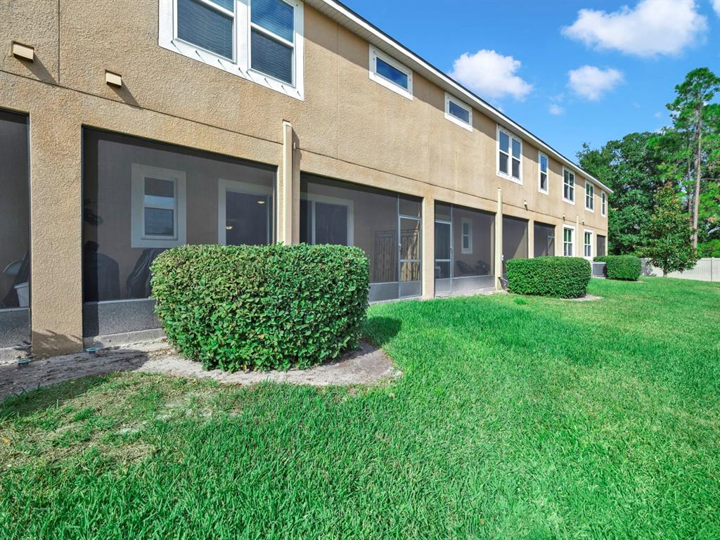 10212 Newel Valley Loop Riverview, FL 33569 - Photo 49 of 72 a view of a house next to a yard