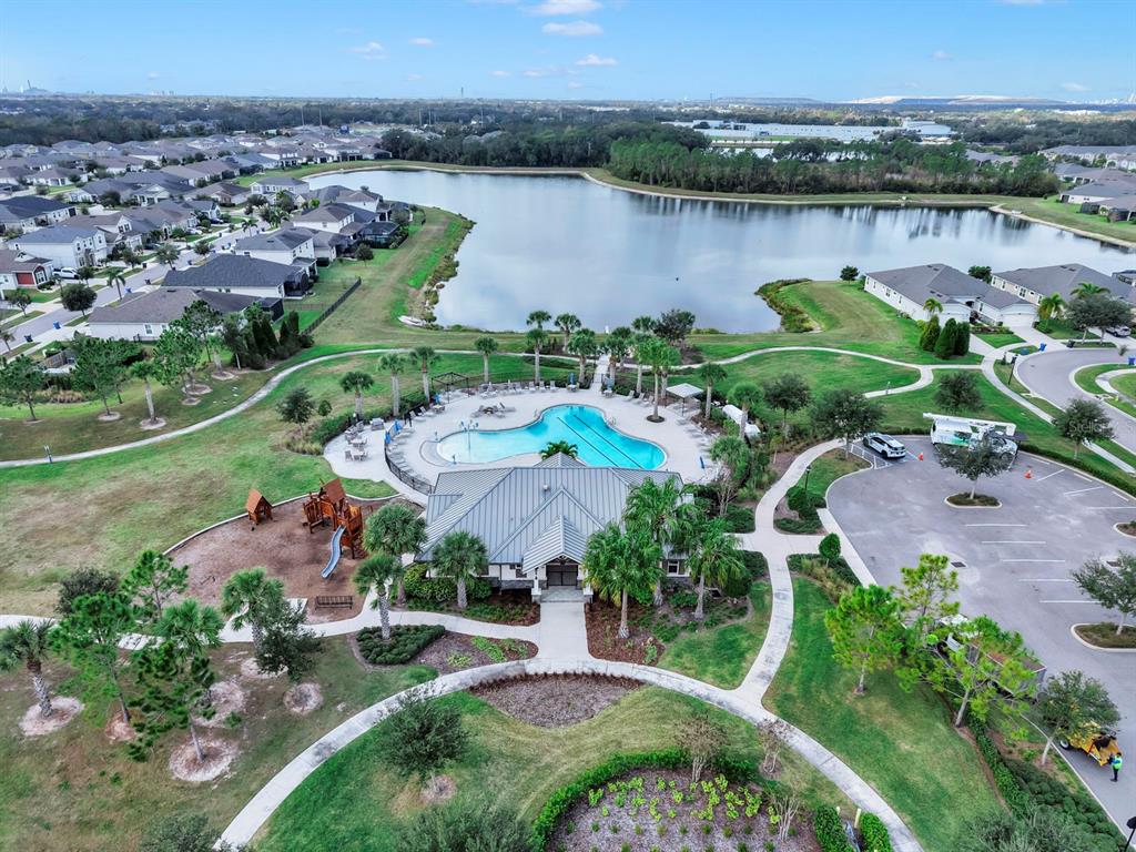 10212 Newel Valley Loop Riverview, FL 33569 - Photo 57 of 72 an aerial view of lake and residential houses with outdoor space and lake view