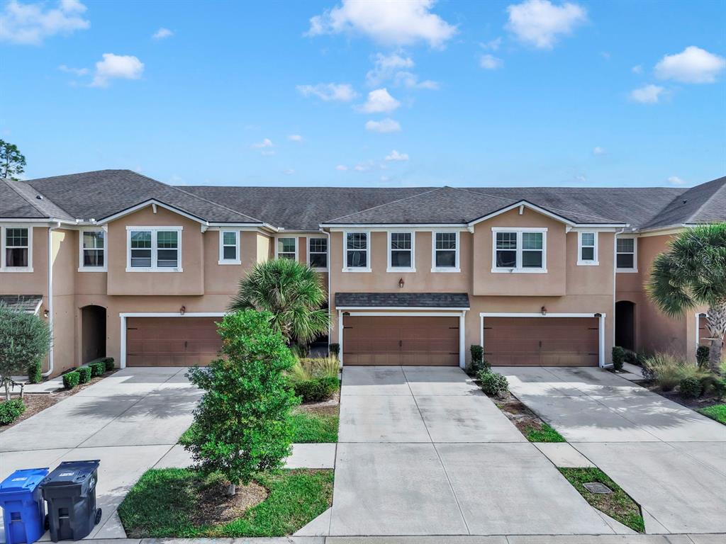 10212 Newel Valley Loop Riverview, FL 33569 - Photo 68 of 72 a front view of a house with a garden