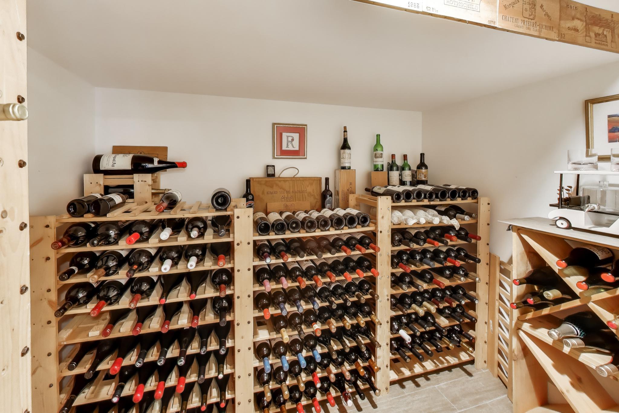 603 Agaming Road Fontana, WI 53125 - Photo 49 of 68 Dedicated wine room wth ample storage for an extensive collection.