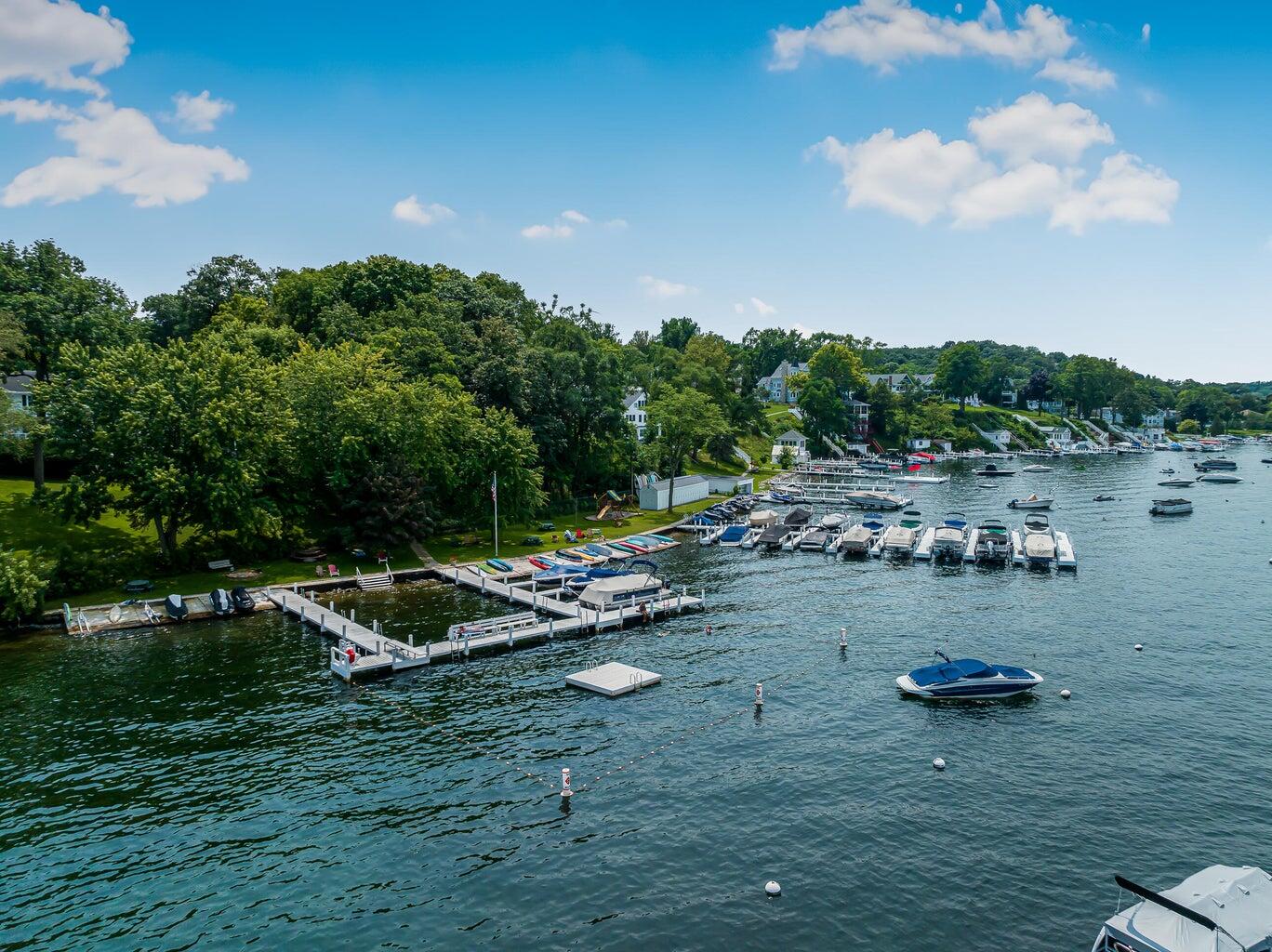603 Agaming Road Fontana, WI 53125 - Photo 60 of 68 Over 100 yards of waterfront. Plenty of room to stretch out on private, association property.