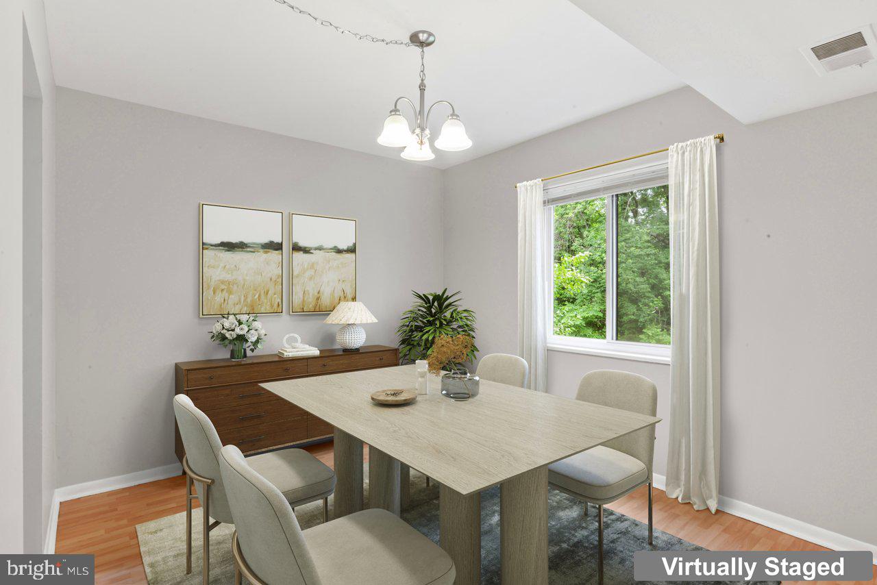 1422 Northgate Square, Unit 12B Reston, VA 20190 - Photo 10 of 36 Dining Room - Virtually Staged
